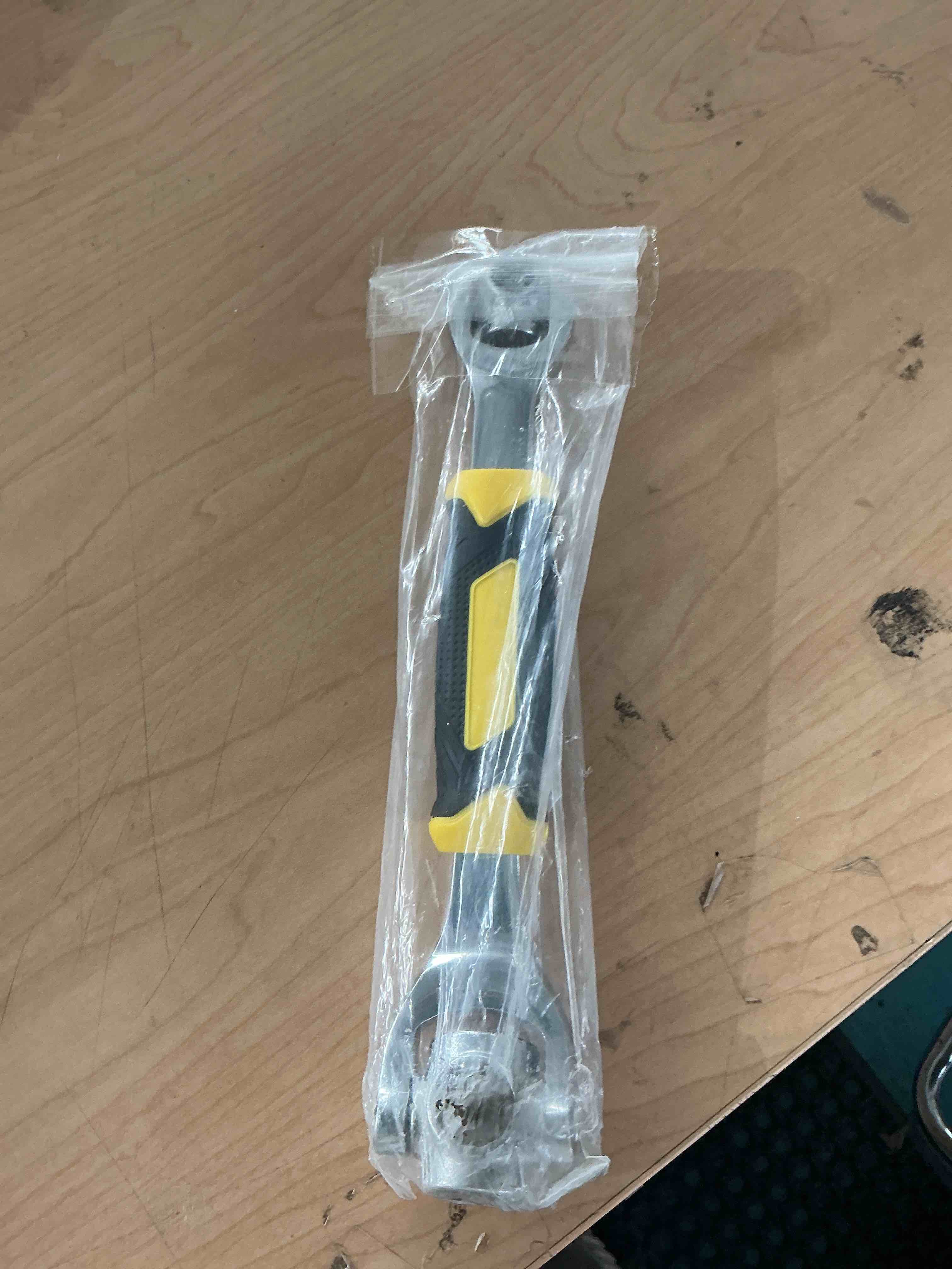 Condition photo showing New/Like New for 52-in-1 socket wrench with non-slip handle & swivel head for home & auto repair yellow