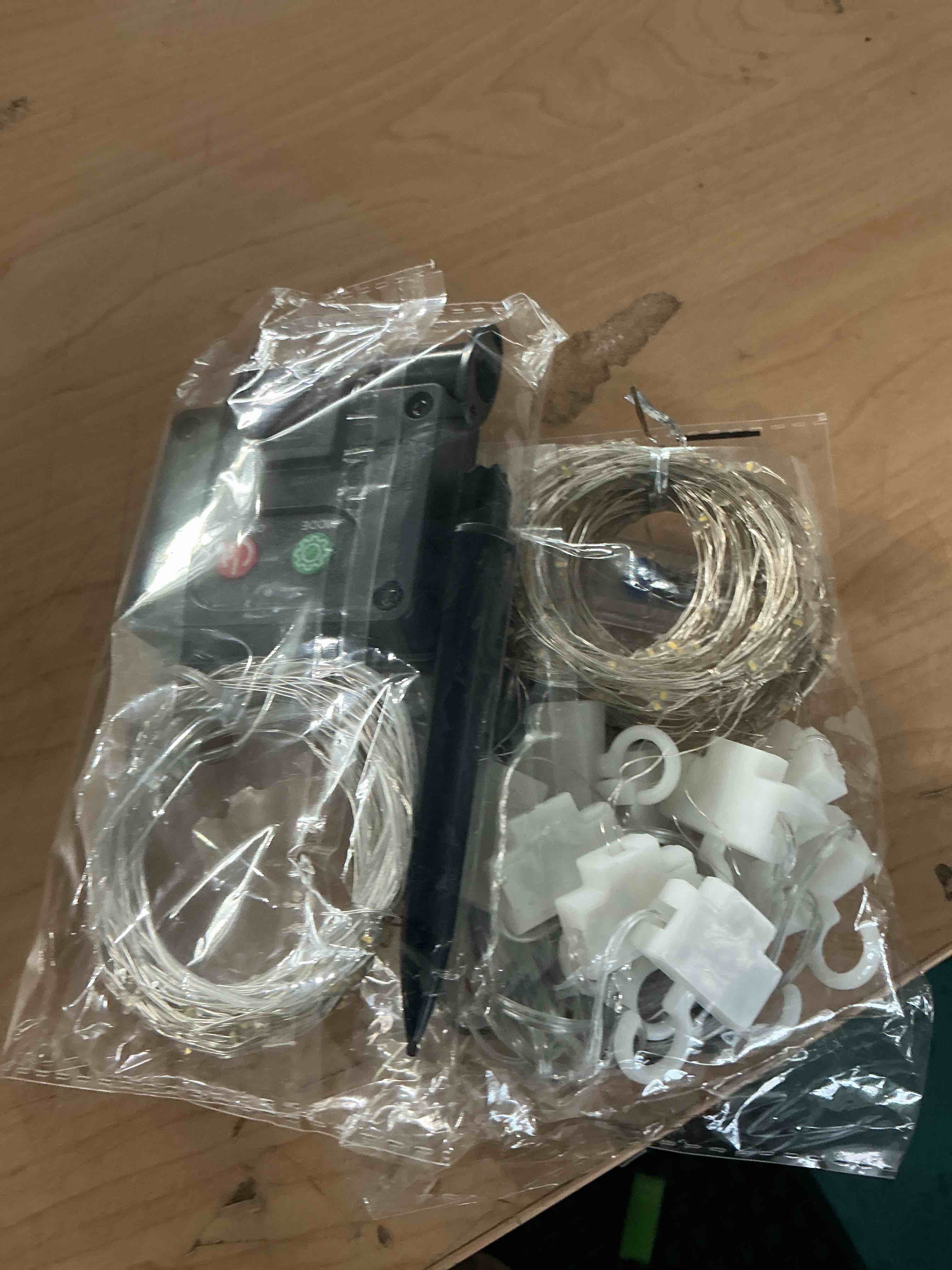 Condition photo showing New/Like New for brightown 300 led fairy curtain lights, 9.8ft x 9.8ft warm white curtain string lights, usb plug in 8 lighting modes christmas decoration, hanging lights with remote for bedroom indoor weddings dorm