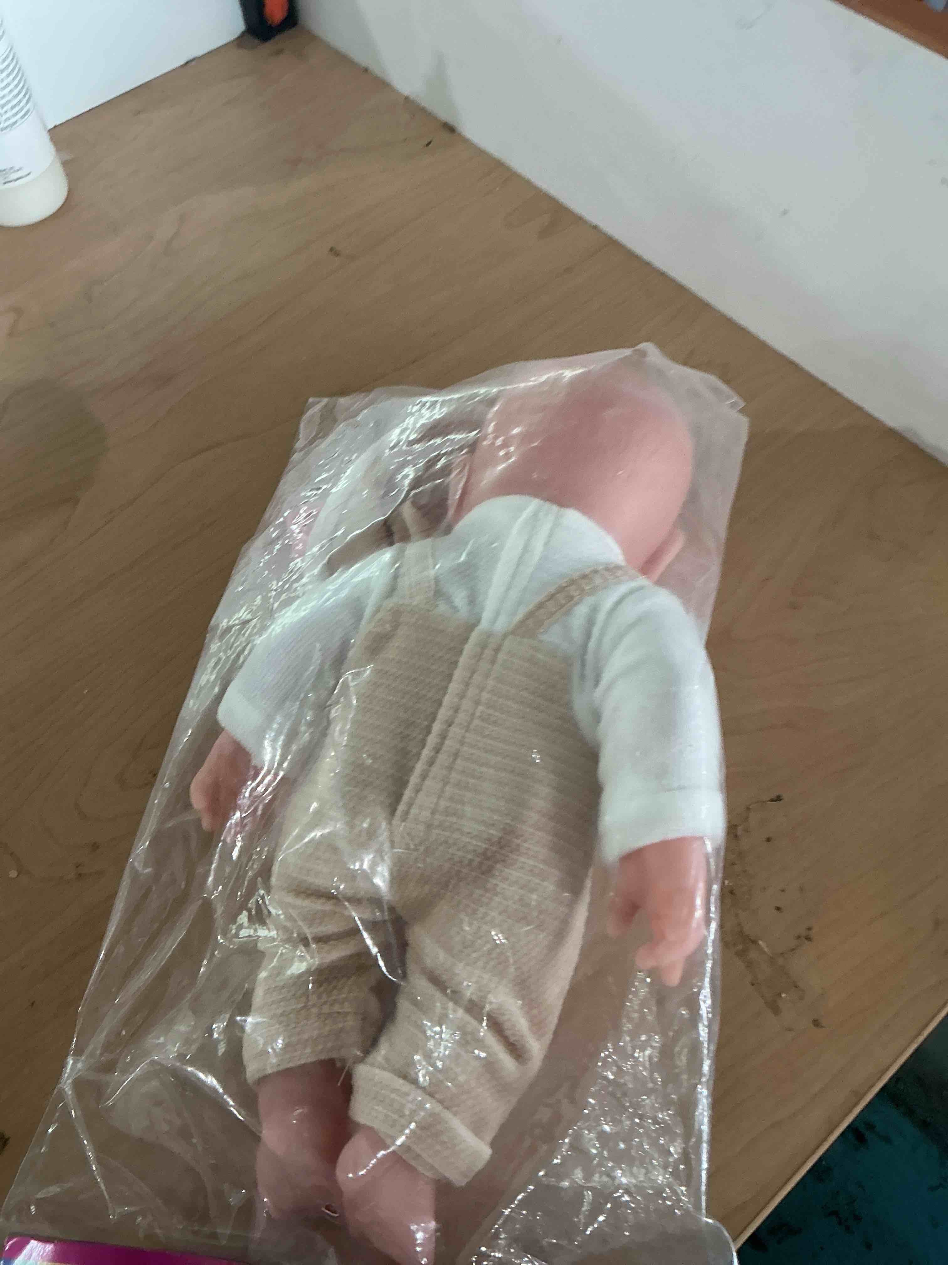 Condition photo showing New/Like New for 12 inch baby doll
