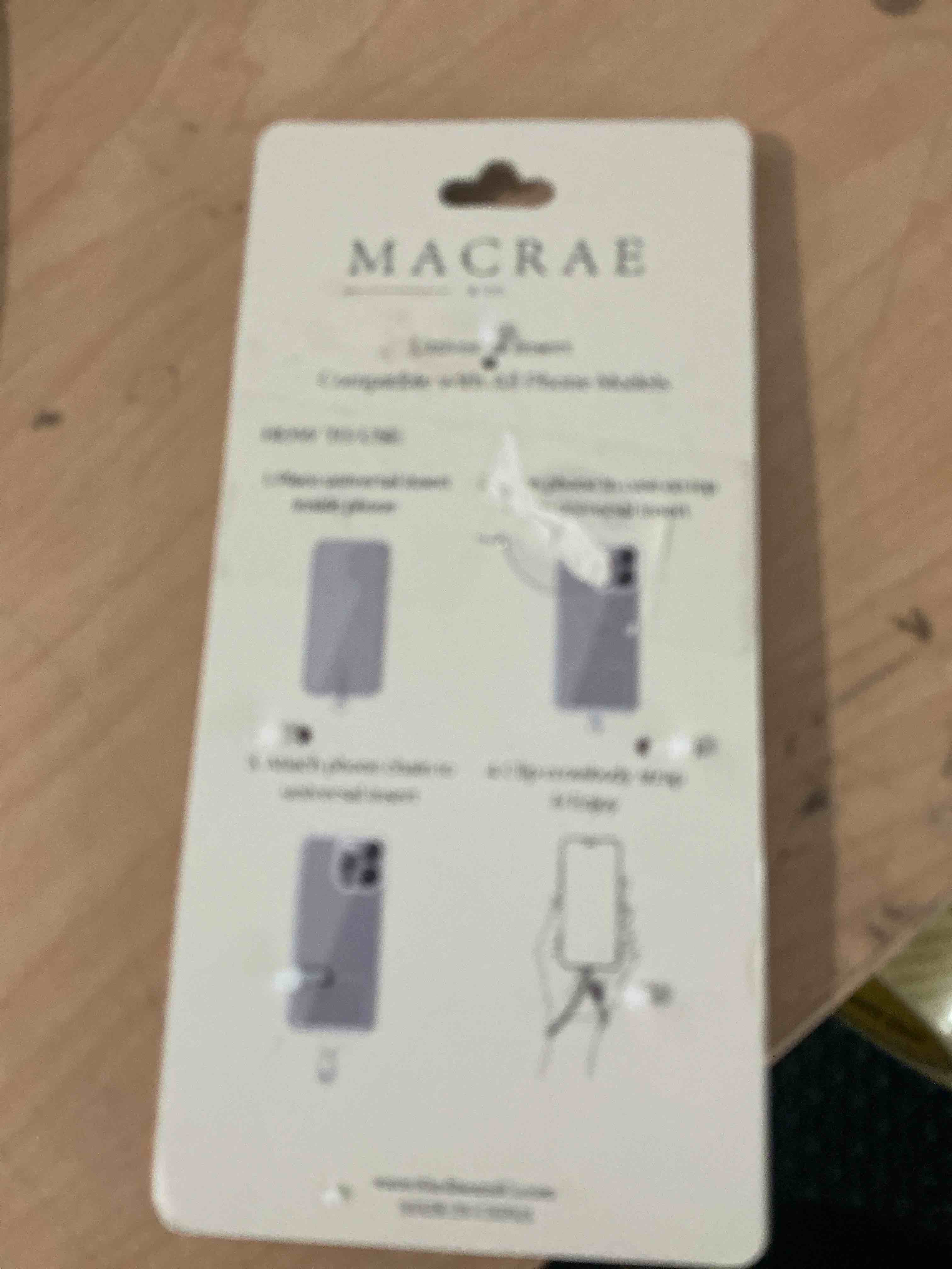 Condition photo showing New/Like New for the macrea& co phone wristlet features, orange and pink, natural stone with gold plated hardware