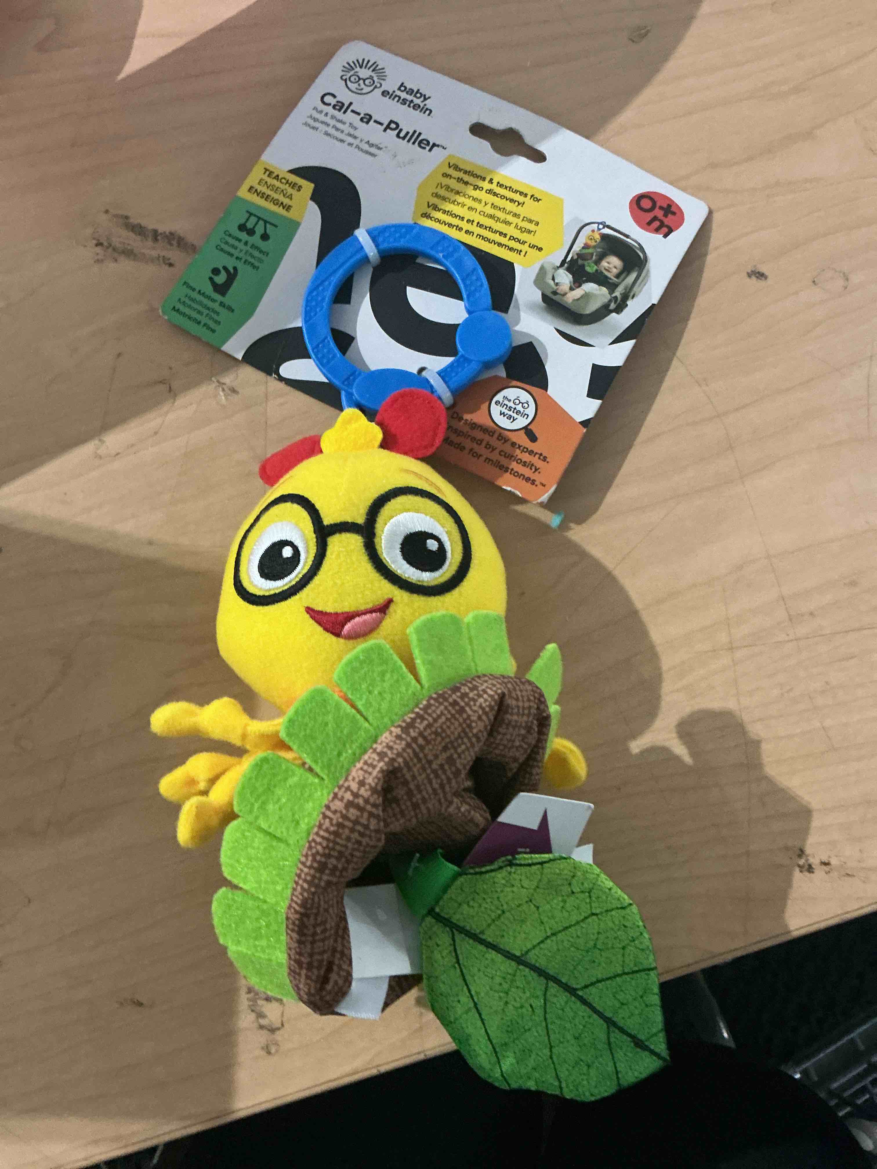 Condition photo showing New/Like New for baby einstein cal-a-puller pull & shake stroller toy, ages 0 months and up
