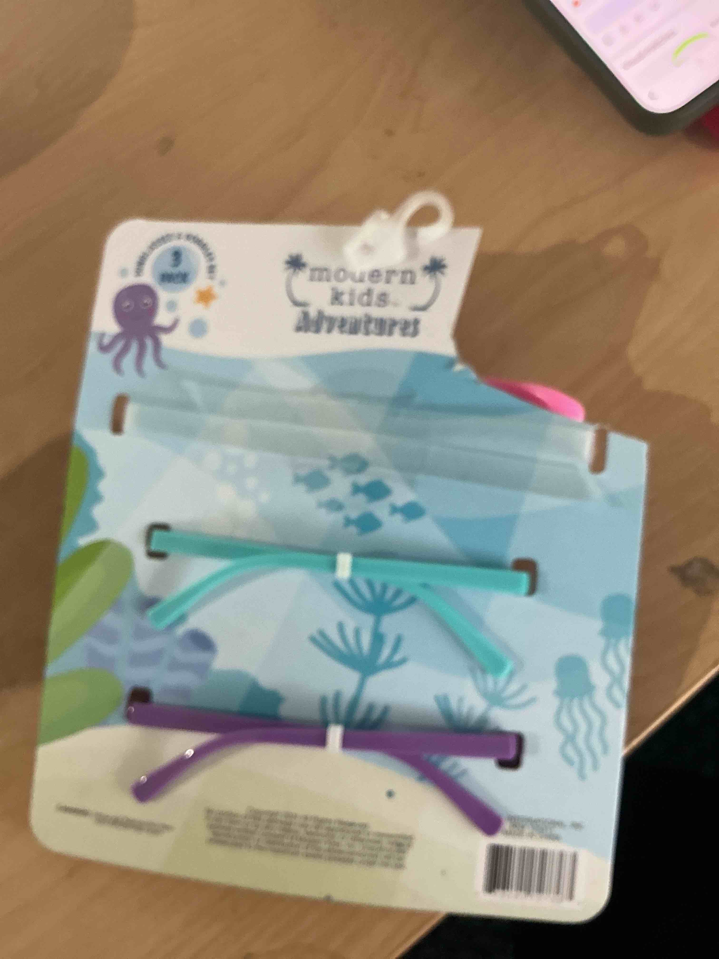 Condition photo showing New/Like New for modern kids, adventure set features branded, swimming goggles and sunglasses designed with uv protection, pink swinging goggles with soft silicone seal for leak proof fit