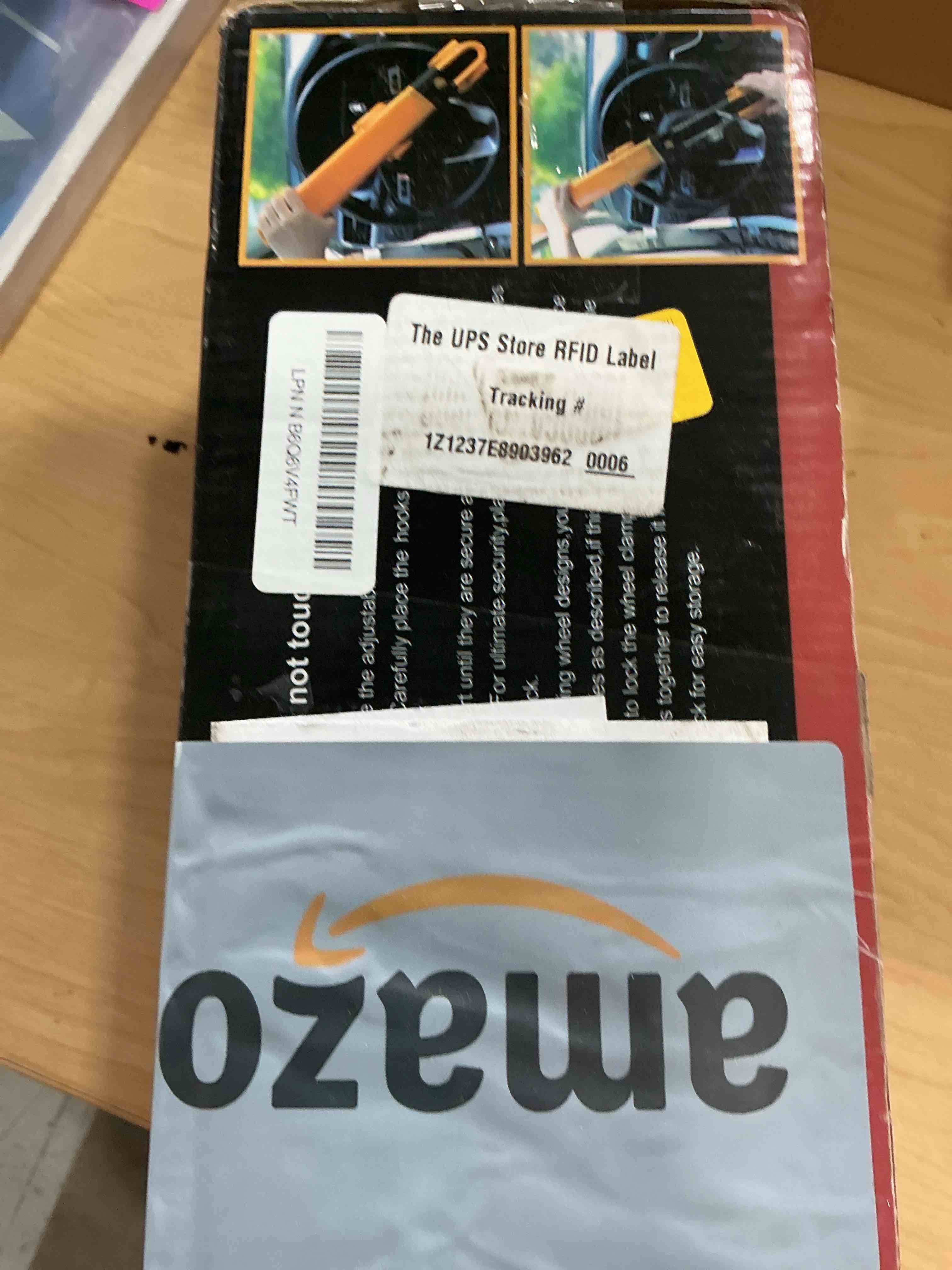 Condition photo showing Good Condition for tevlaphee steering wheel lock anti-theft car device heavy duty security car lock antitheft locking devices great deterrent adjustable car wheel lock anti theft for vehicle truck suv with 3 keys (red)