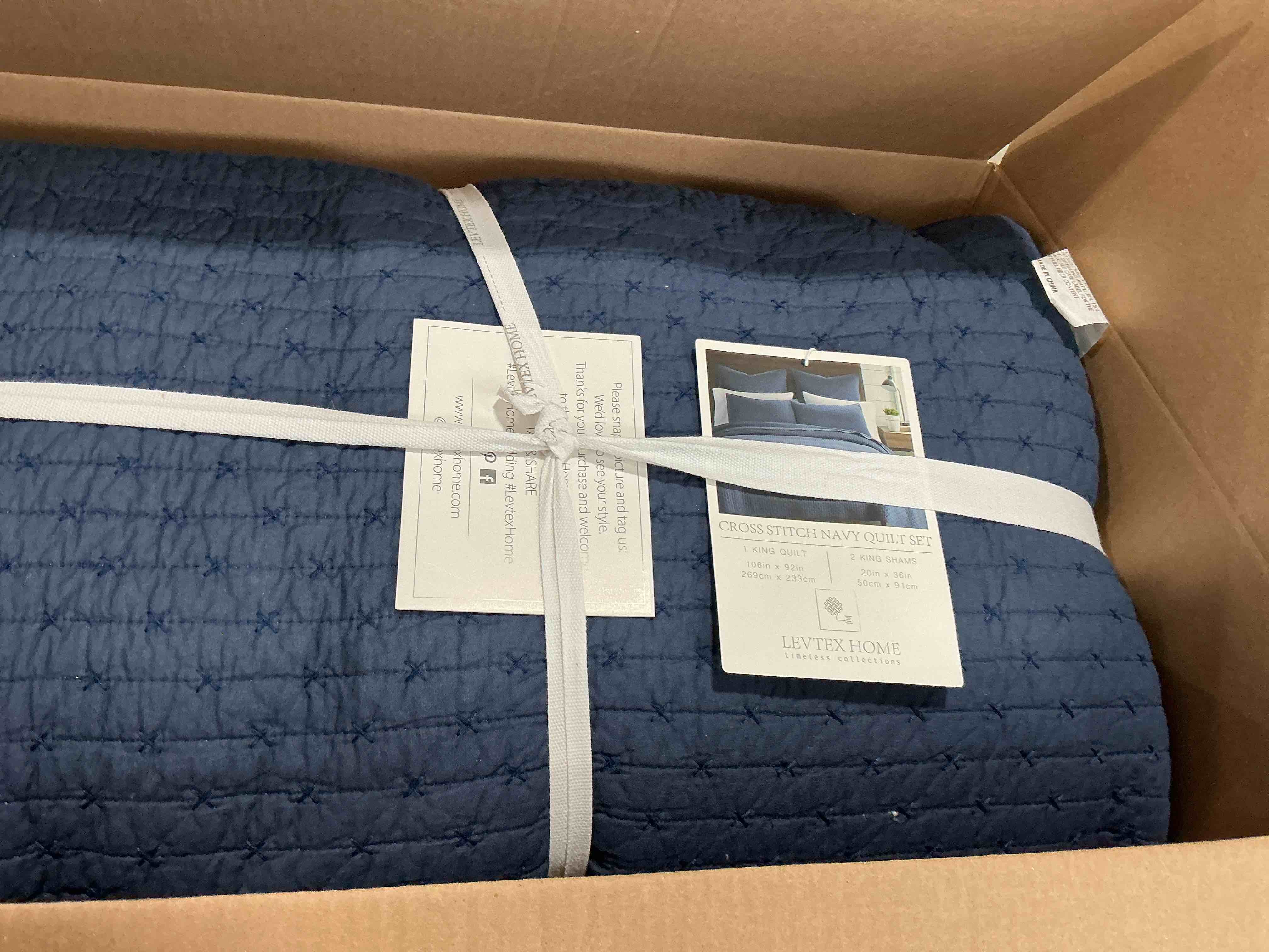 Condition photo showing New/Like New for levtex home cross stitch reversible king/cal king quilt set (106x92in) and 2 pillow shams (36x20in) - stitch texture - navy - cotton king size quilt bedding set - lightweight soft pre-washed