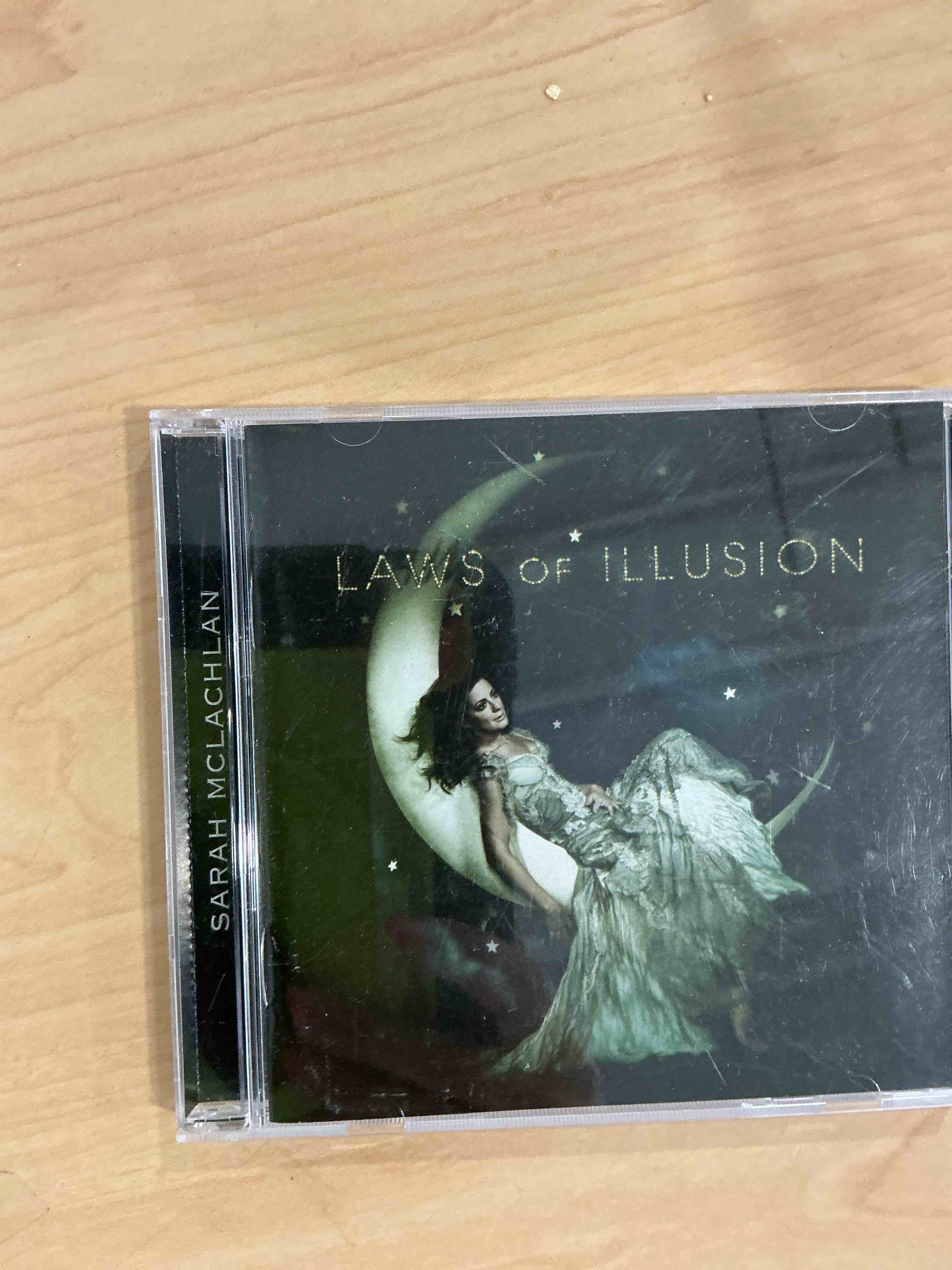 Condition photo showing New/Like New for laws of illusion (deluxe cd/dvd) by arista (2010-06-15)