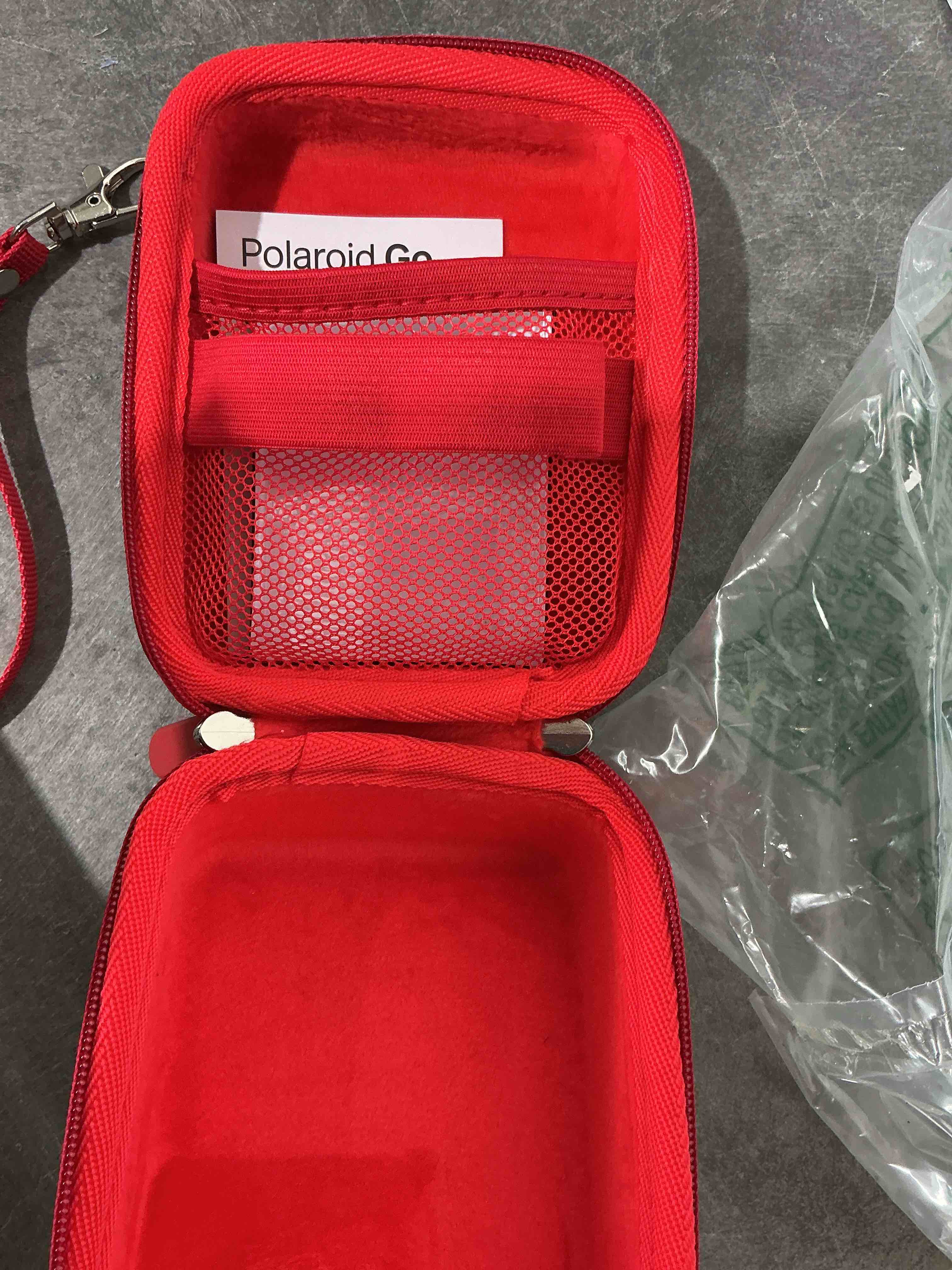 Condition photo showing Good Condition for WOGOZAN Hard Case for Polaroid Go/Go , Camera Case of Polaroid Go, Travel Storage Bag with 5 Go Magnetic Picture Frames and Handle Strap - White (No Camera) White Polaroid Go Case
