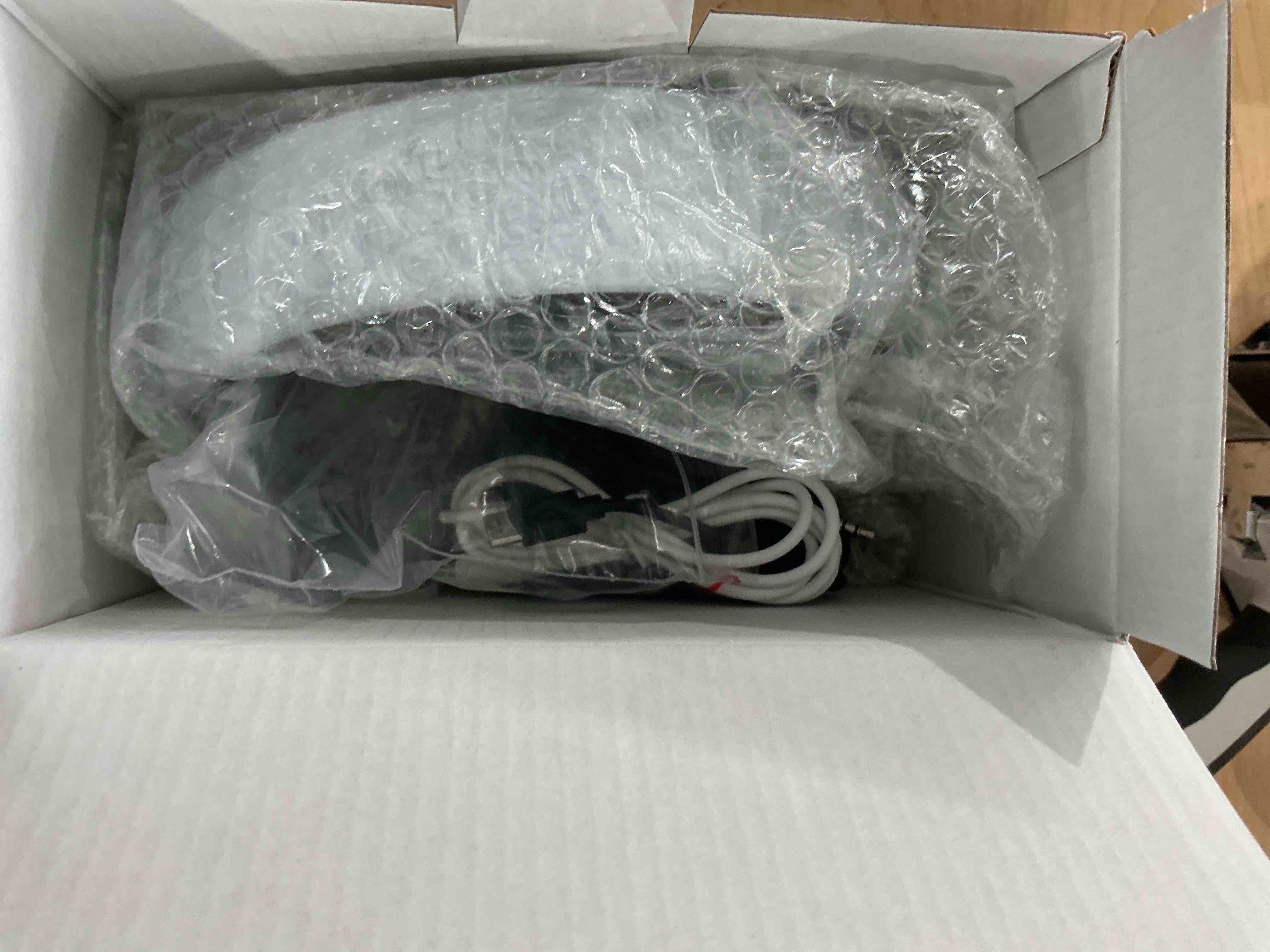 Condition photo showing New/Like New for Ozeino 2.4GHz Wireless Gaming Headset for PC, Ps5, Ps4 - Lossless Audio USB & Type-C Ultra Stable Gaming Headphones with Flip Microphone, 40-Hr Battery Gamer Headset for Switch, Laptop, Mobile, Mac Black and White