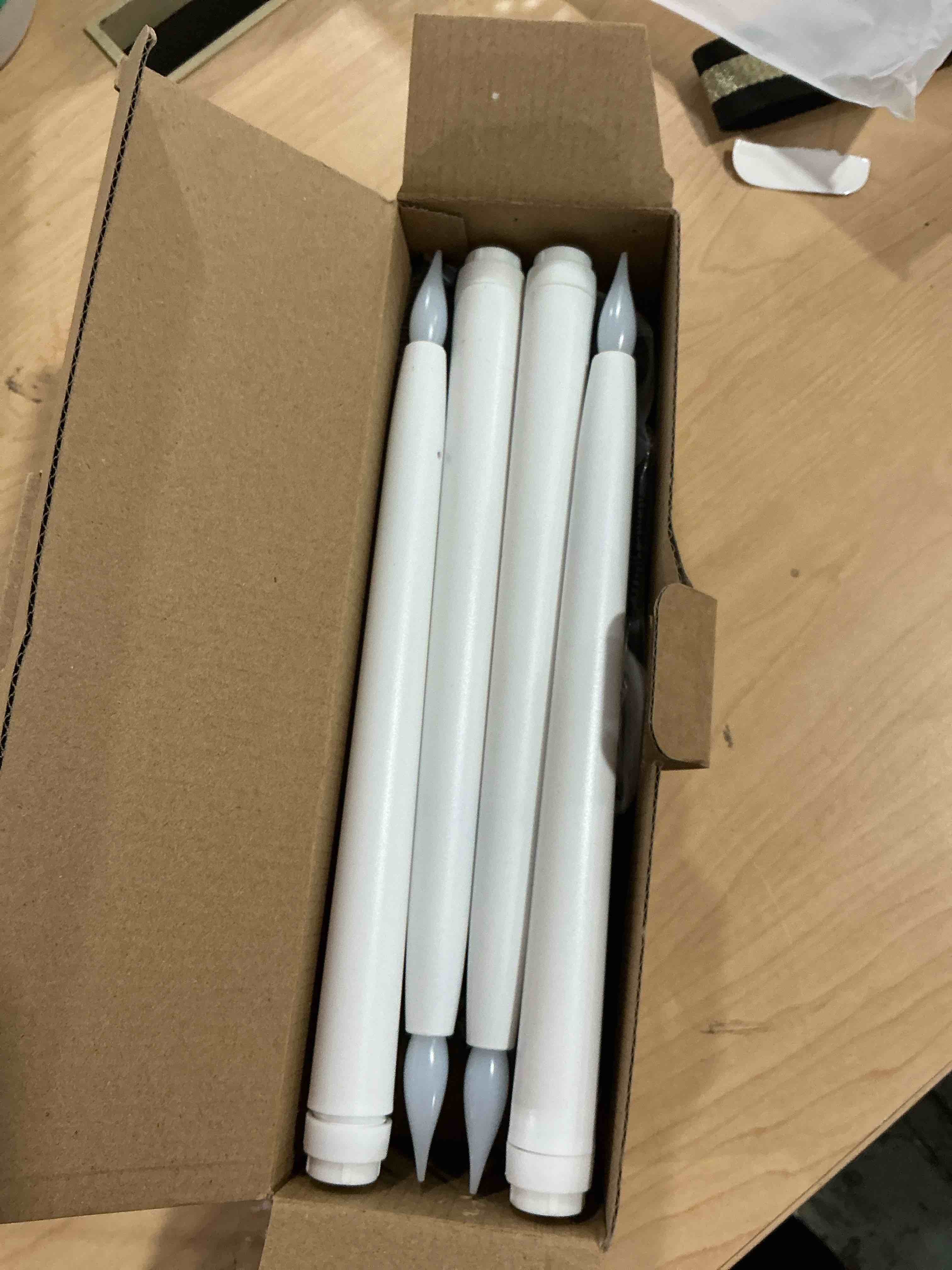 Condition photo showing New/Like New for 13.2" Battery Operated Window Candles with Dusk to Dawn Sensor, LED Flickering Flame, 5000K Cool White Christmas Candle Lights for Windows, Indoor Holiday Decor, 4 Pack, Black Holders Black Dusk to Dawn-5000K