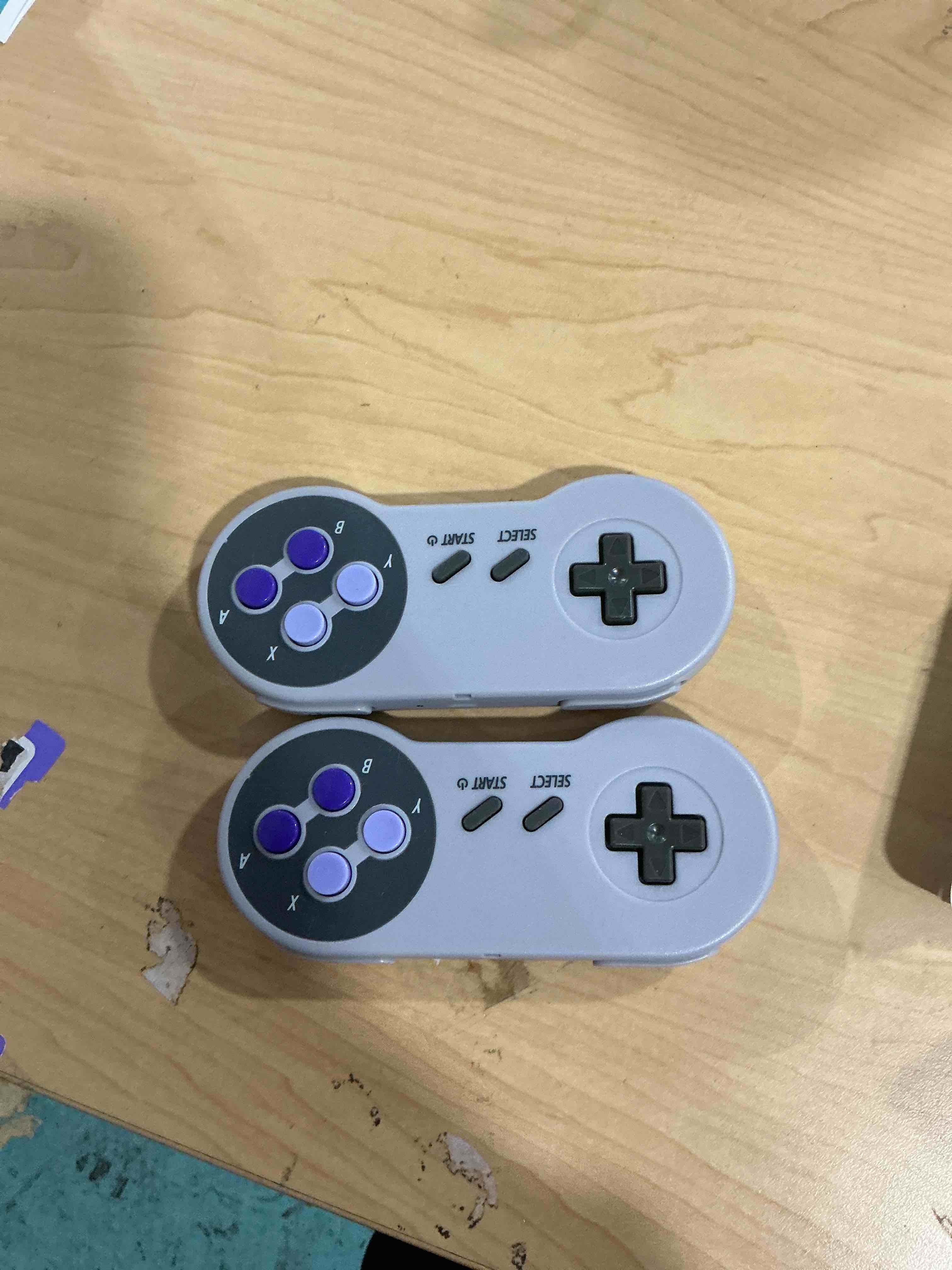 Condition photo showing Good Condition for KIWITATA 2 Pack 2.4GHz Wireless Controller for SNES Original Console, Rechargeable Wireless Remote Gamepad Controller for SNES Super Entertainment System Console Purple button