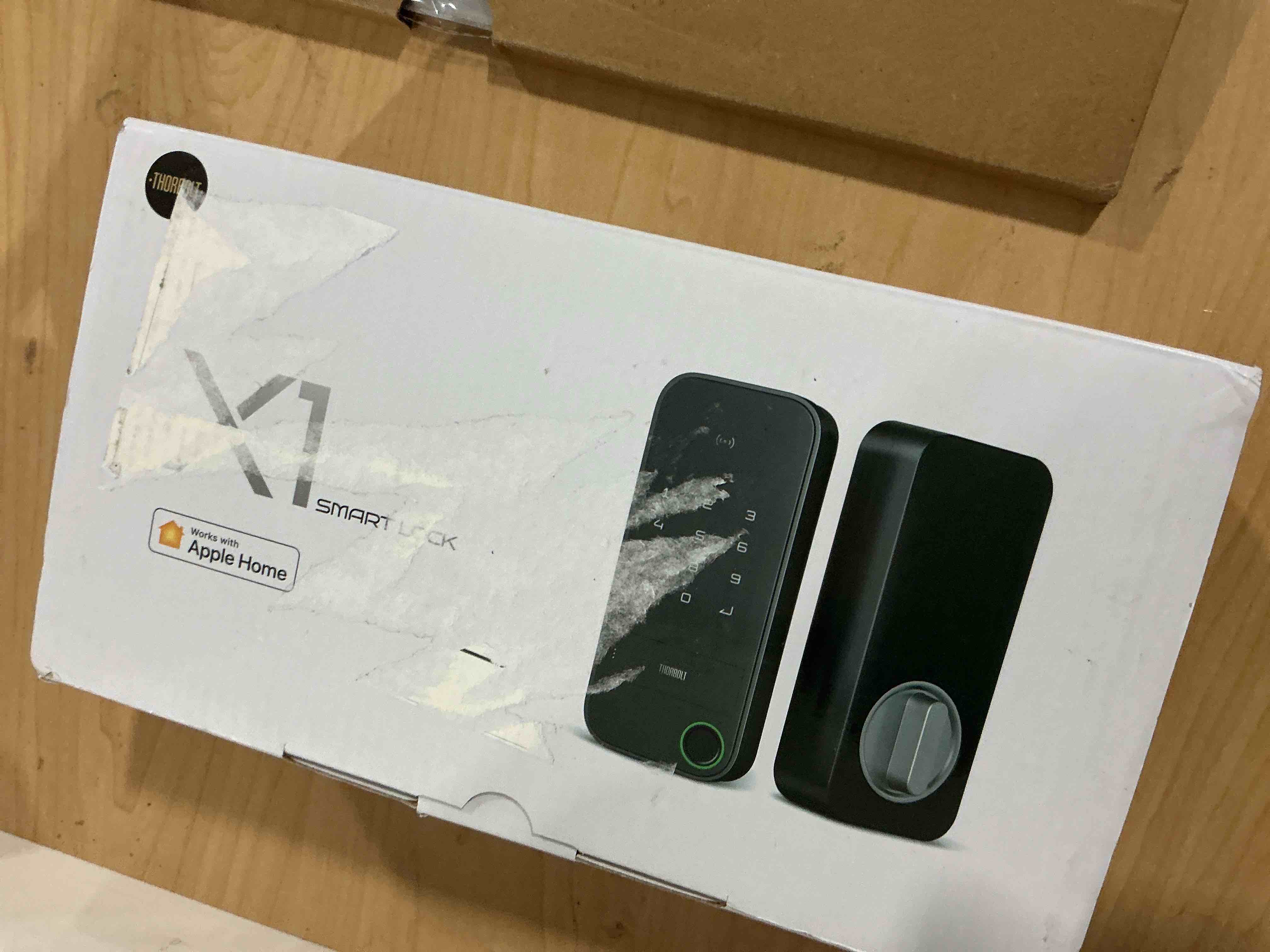 Condition photo showing Good Condition for ThorBolt X1 Apple Home Key Lock, iOS ONLY Smart Keyless Entry HomeKit Door Lock with Fingerprint, Keypad Deadbolt Lock Works with HomeKit Over Thread (Border Router Required), IP65 Weatherproof, Black X1 Black