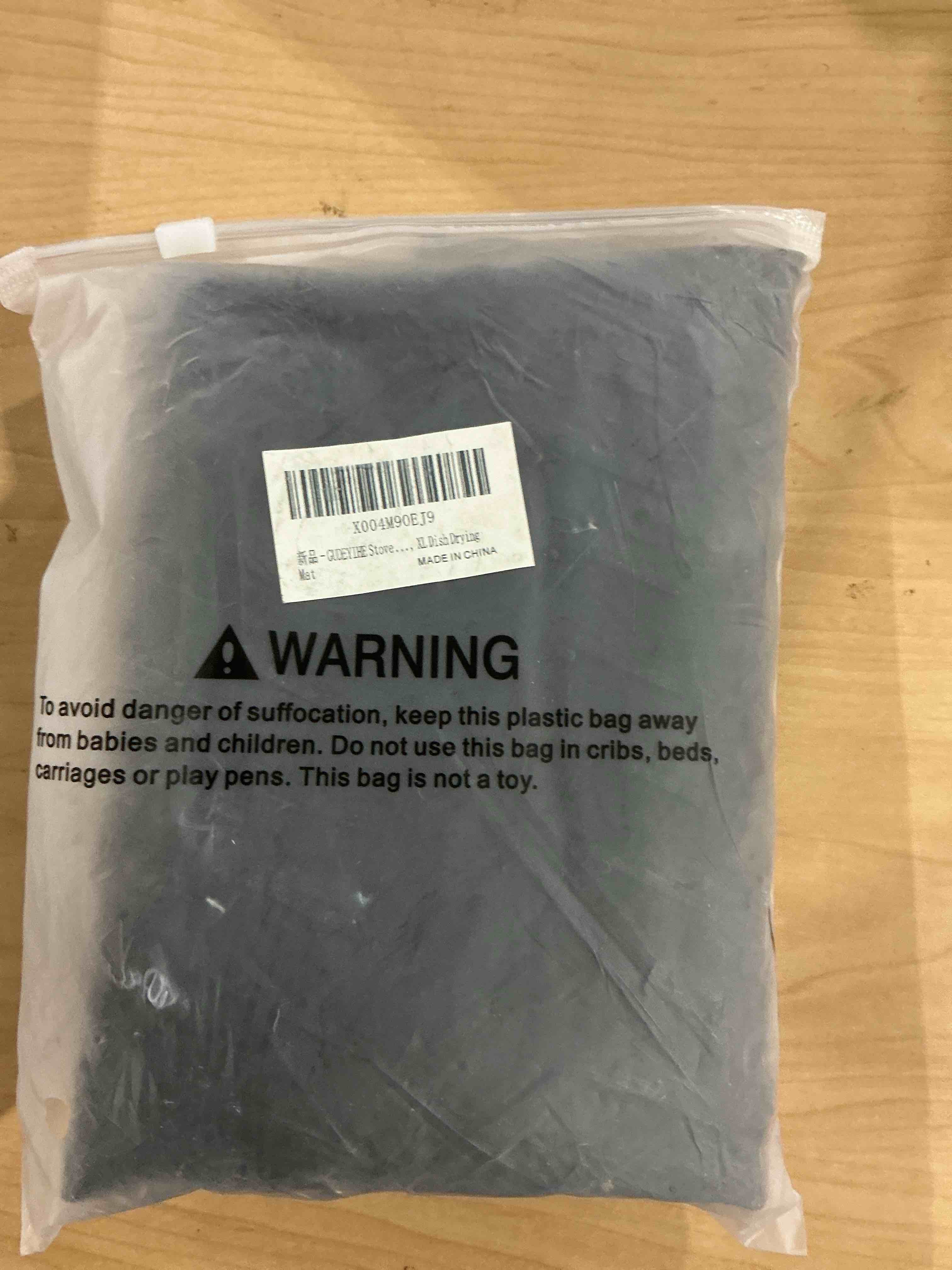 Condition photo showing Good Condition for Stove Top Covers for Electric Stove, Thickened Premium Silicone Stove Mat for Glass Top Stove, 28 x 20 Glass Stove Top Cover Protector, Oven Range Top Cover, XL Dish Drying Mat 28" x 20" Black