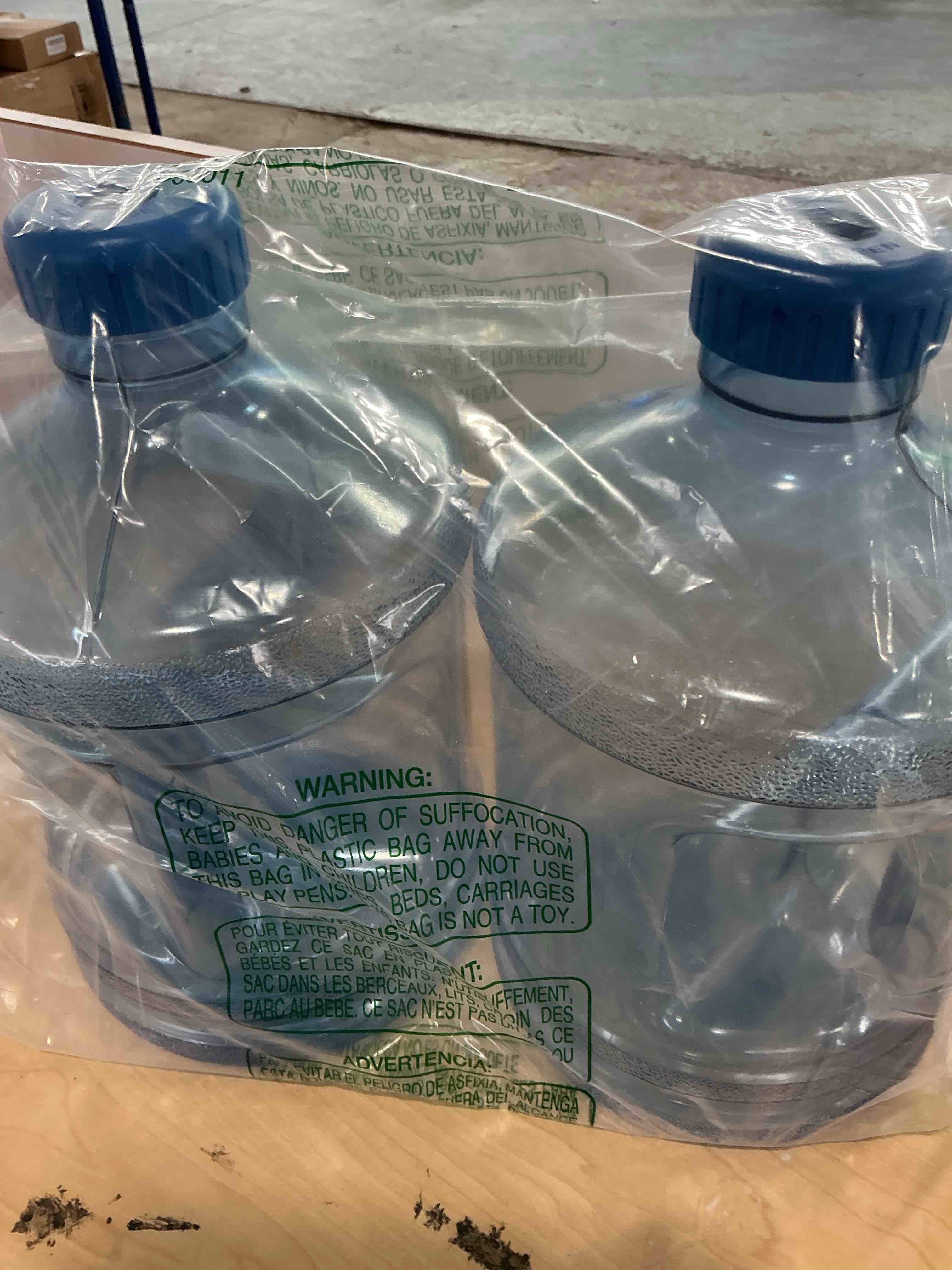 Condition photo showing Good Condition for 2 pieces round plastic water jug,1 gallon water bottle with handle and screw cap,large reusable leak proof bottle for camping,outdoor travel,gym broken cap 
