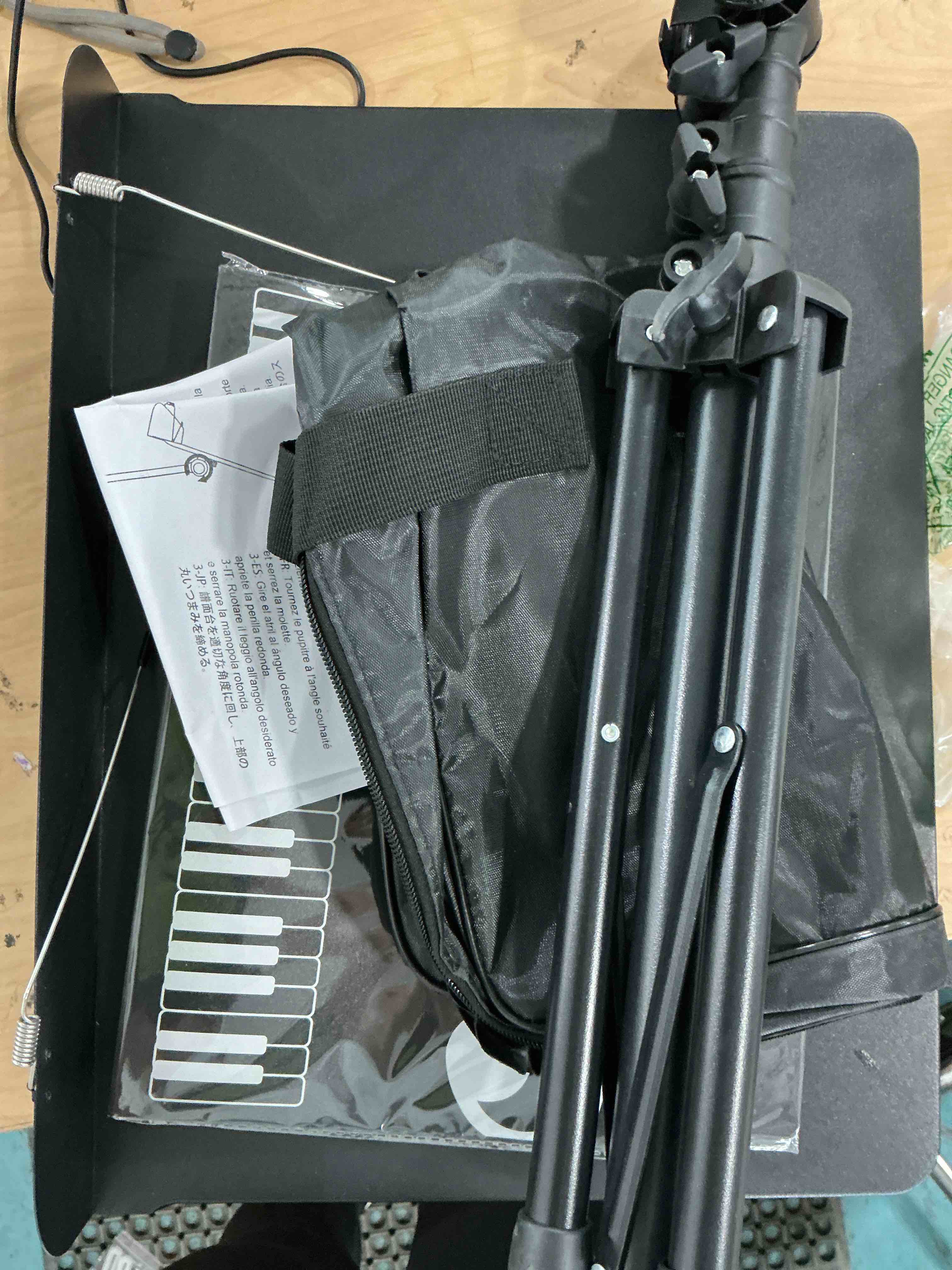Condition photo showing Good Condition for gleam sheet music stand - full metal with carrying bag, phone holder, sheet music folder and clip, 5 in 1 desktop book stand - black