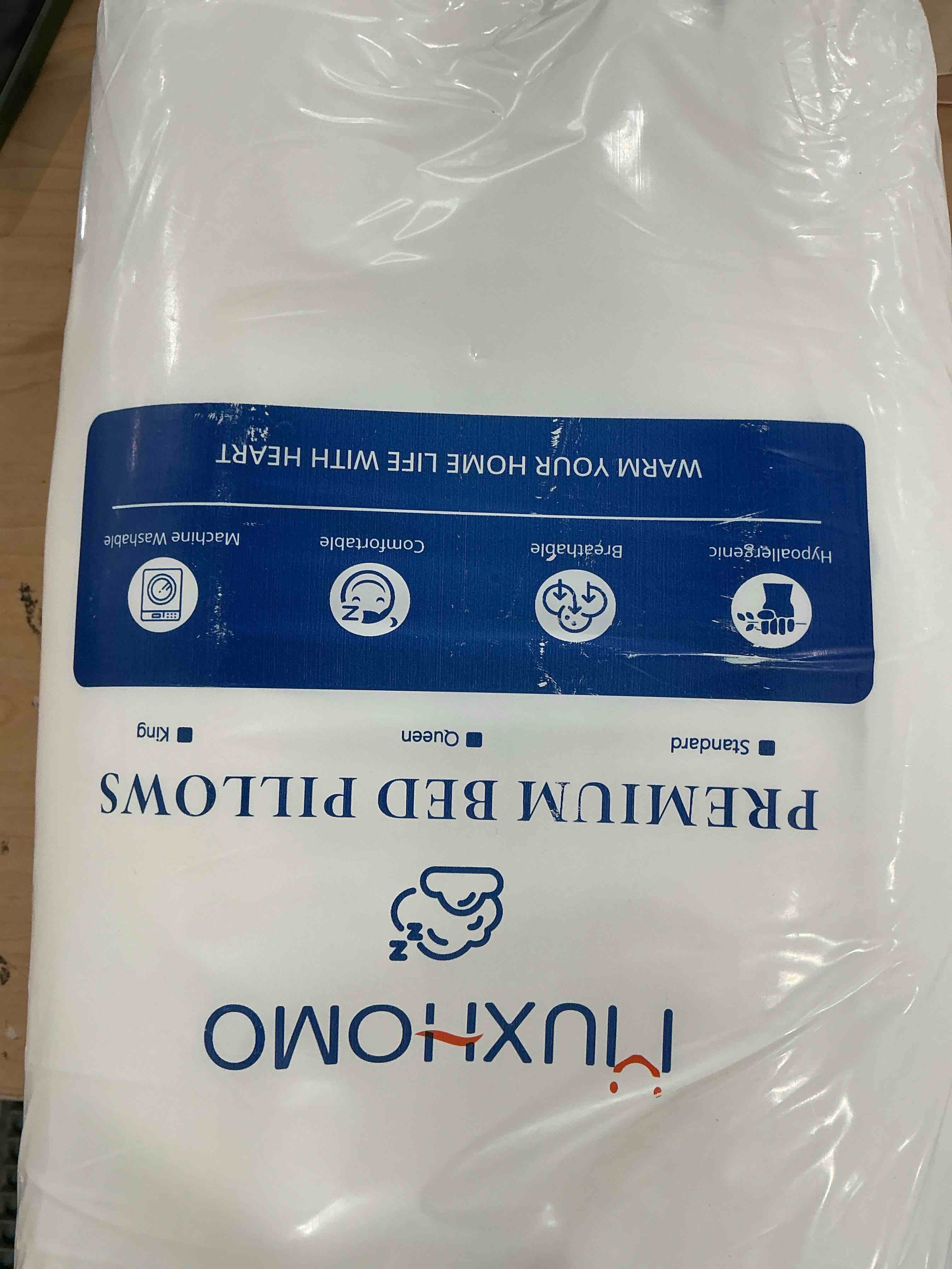 Condition photo showing New/Like New for muxhomo bed pillows queen size set of 2, gusseted sleeping pillows for side, back, and stomach sleepers, hotel quality, oeko-tex certified fluffy supportive down alternative filling, white, 2 pack queen (pack of 2) white