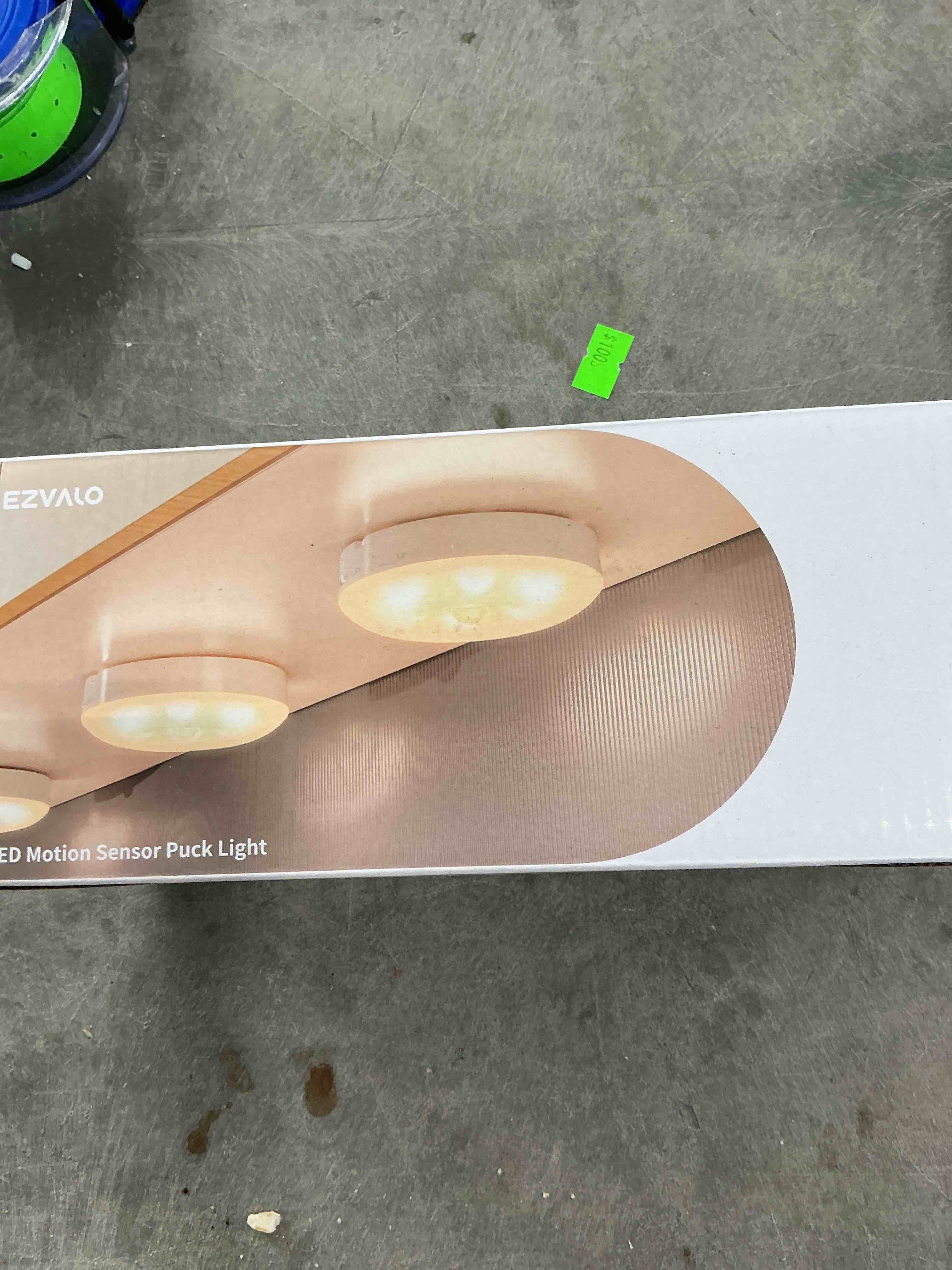 Condition photo showing New/Like New for ezvalo under cabinet lighting,1000mah rechargeable puck lights with remote,3 color temps & 12 rgb motion sensor closet lights indoor, dimmable under counter lights for kitchen, shelf black (6 packs) black 6packs