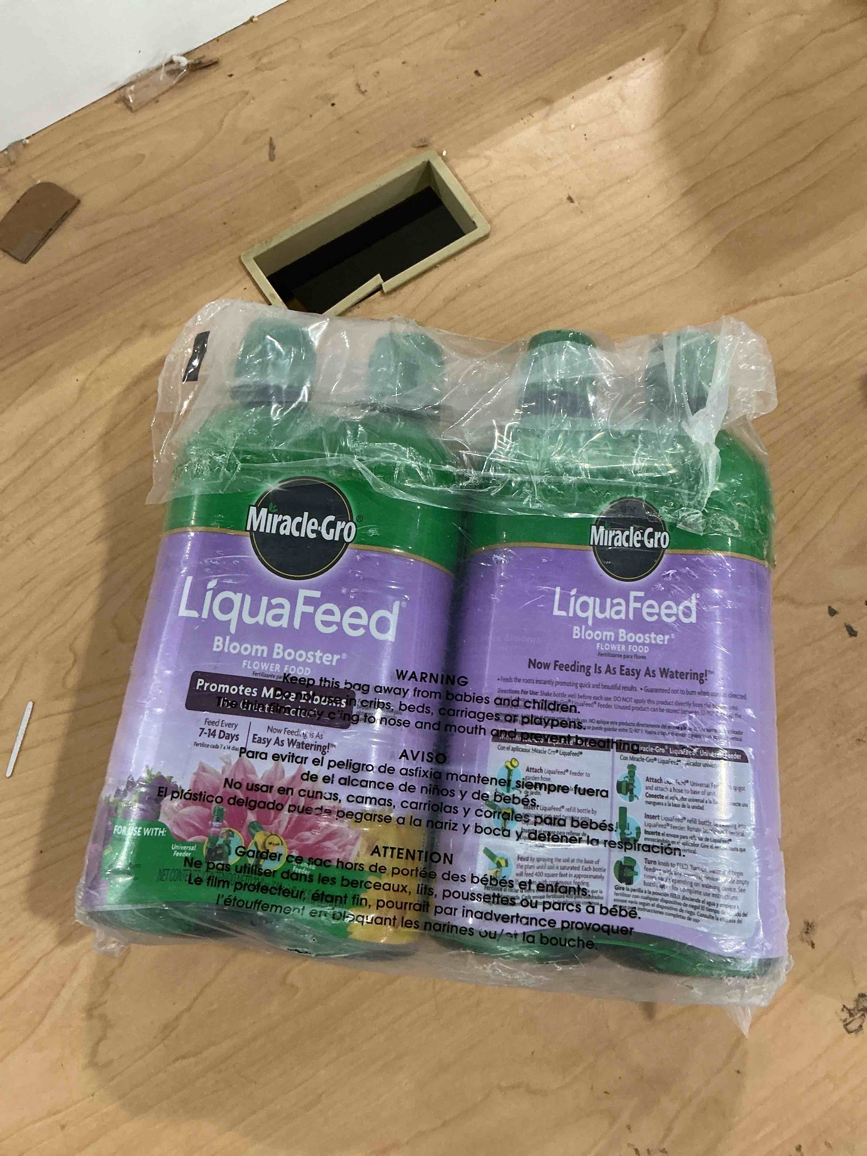 Condition photo showing Good Condition for 4 pack liquafeed refills all purpose fertilizer