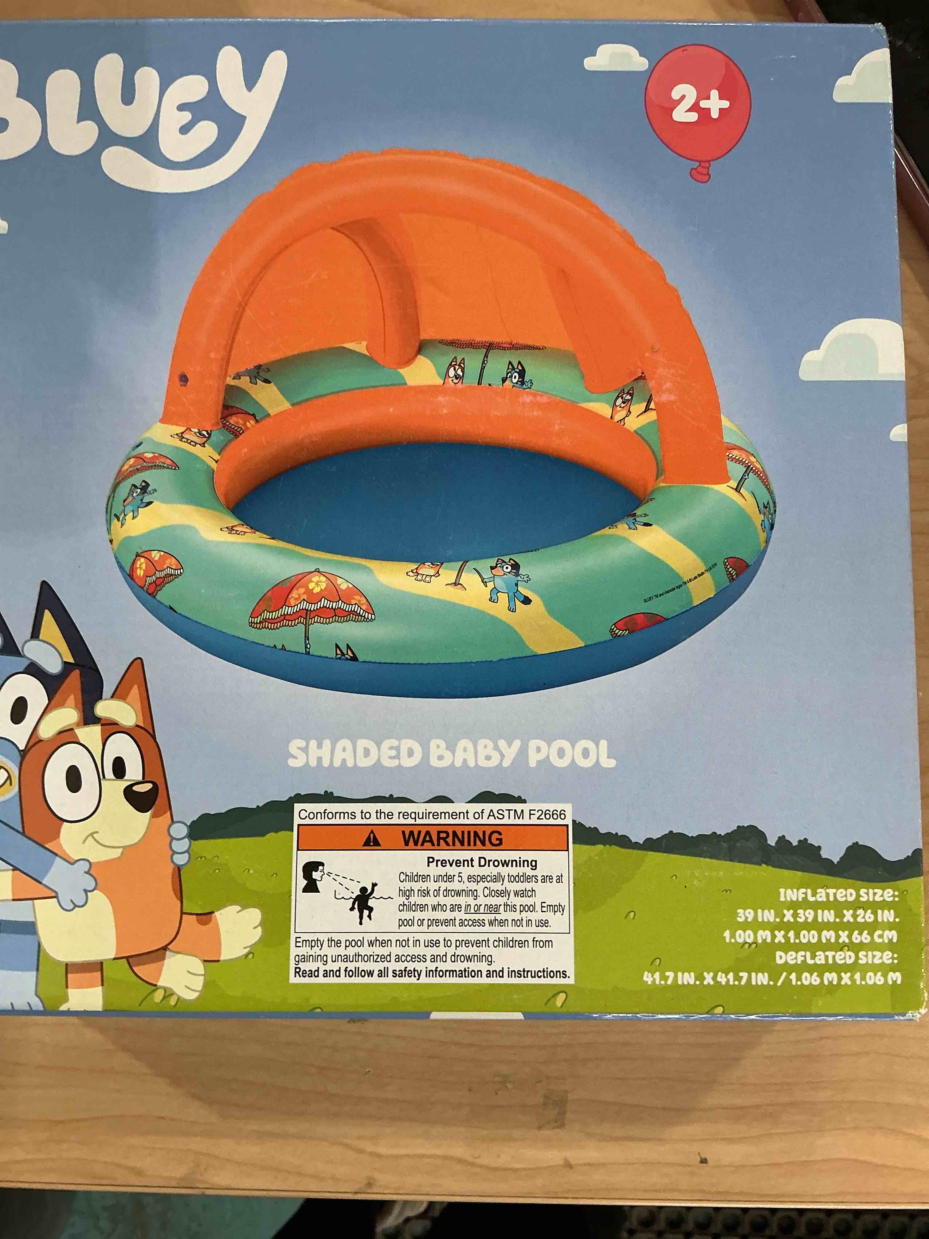 Condition photo showing Brand New for swimways bluey splash mat, kids splash pad, outdoor toys, bluey party supplies and water toys for kids ages 1 & up with shade 