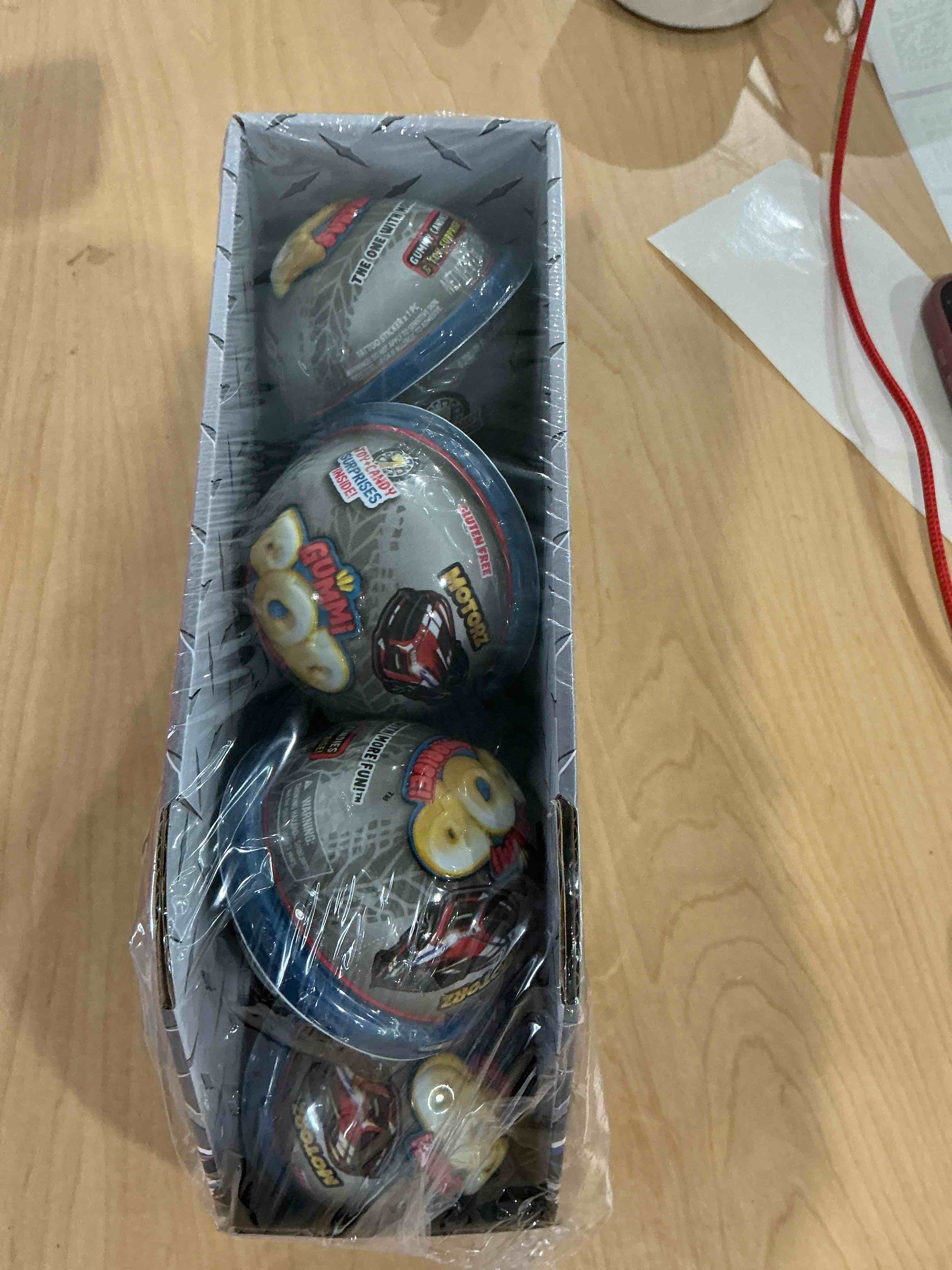 Condition photo showing New/Like New for gummy pop surprise 12 awesome cars to collect with gummy treat inside