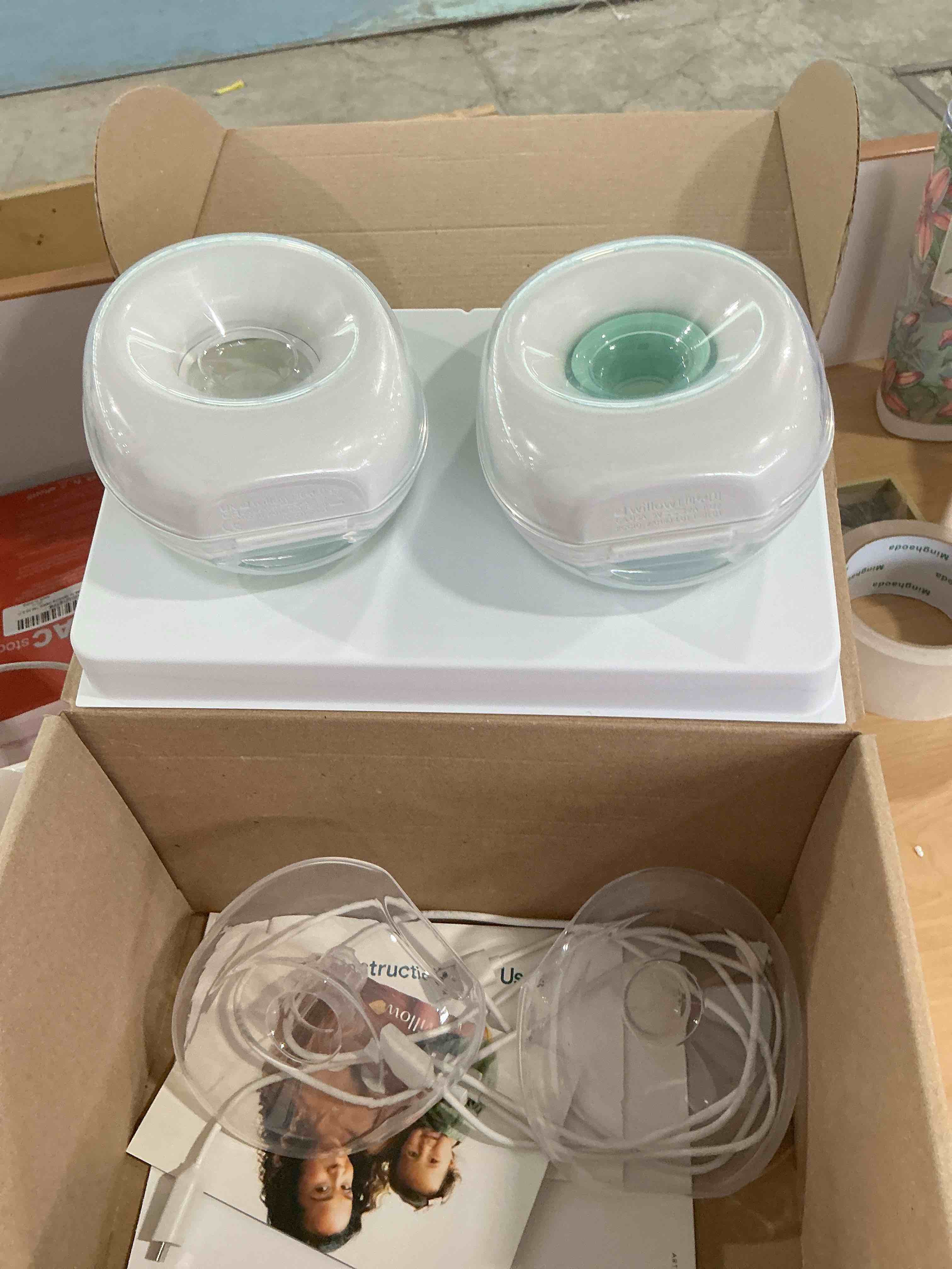 Condition photo showing New/Like New for willow go wearable breast pump, double electric breast pump, cordless, hands free breast pump with 9 levels of hospital grade suction strength, app compatible & fits fully in bra, 21mm & 24mm flange clear