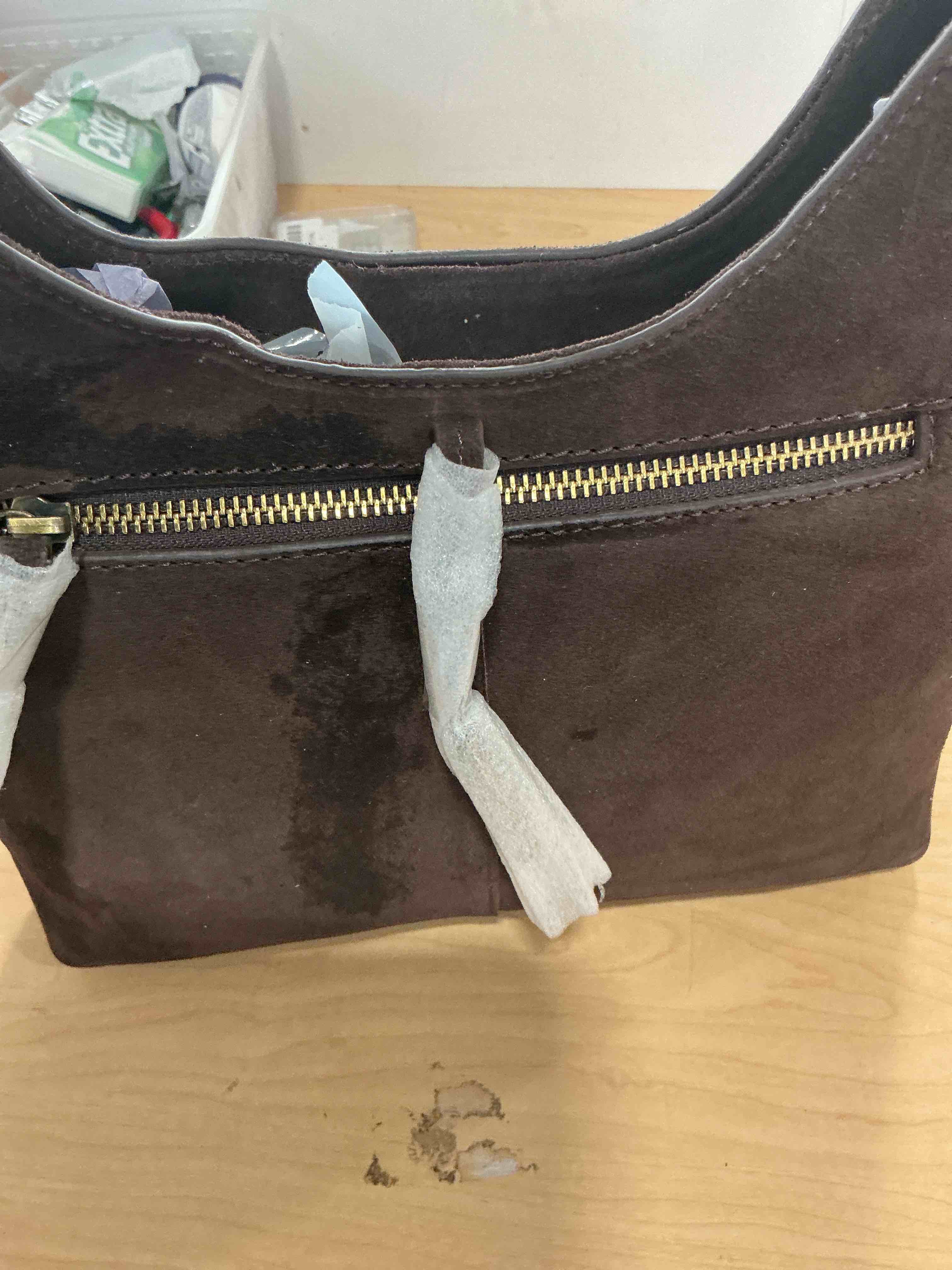 Condition photo showing New/Like New for leather handbag brand new with tags