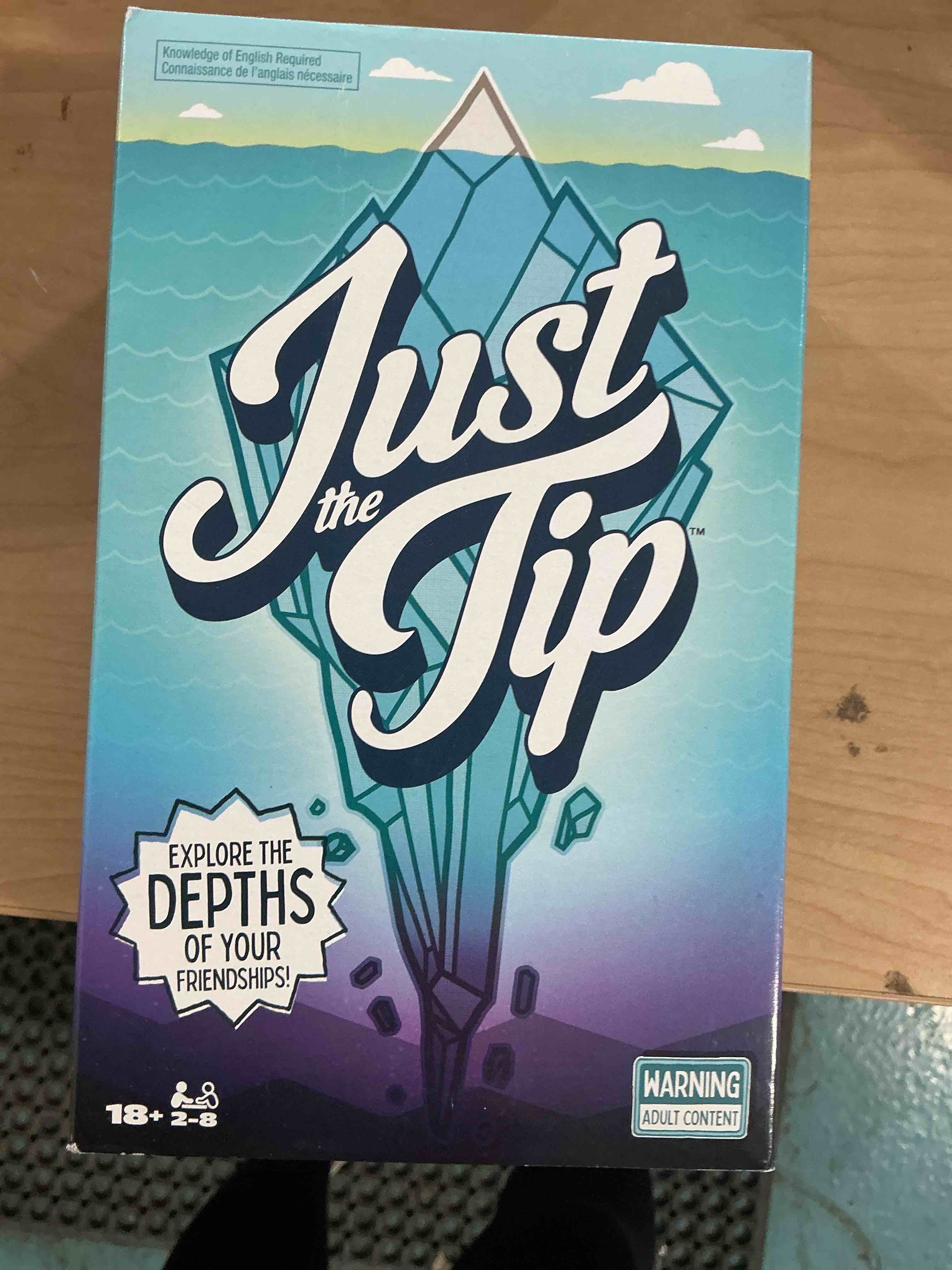 Condition photo showing New/Like New for spin master games, just the tip β explore the depths of your friendships with hilarious questions, party game, adult card game, 2-8 players, for ages 18 & up