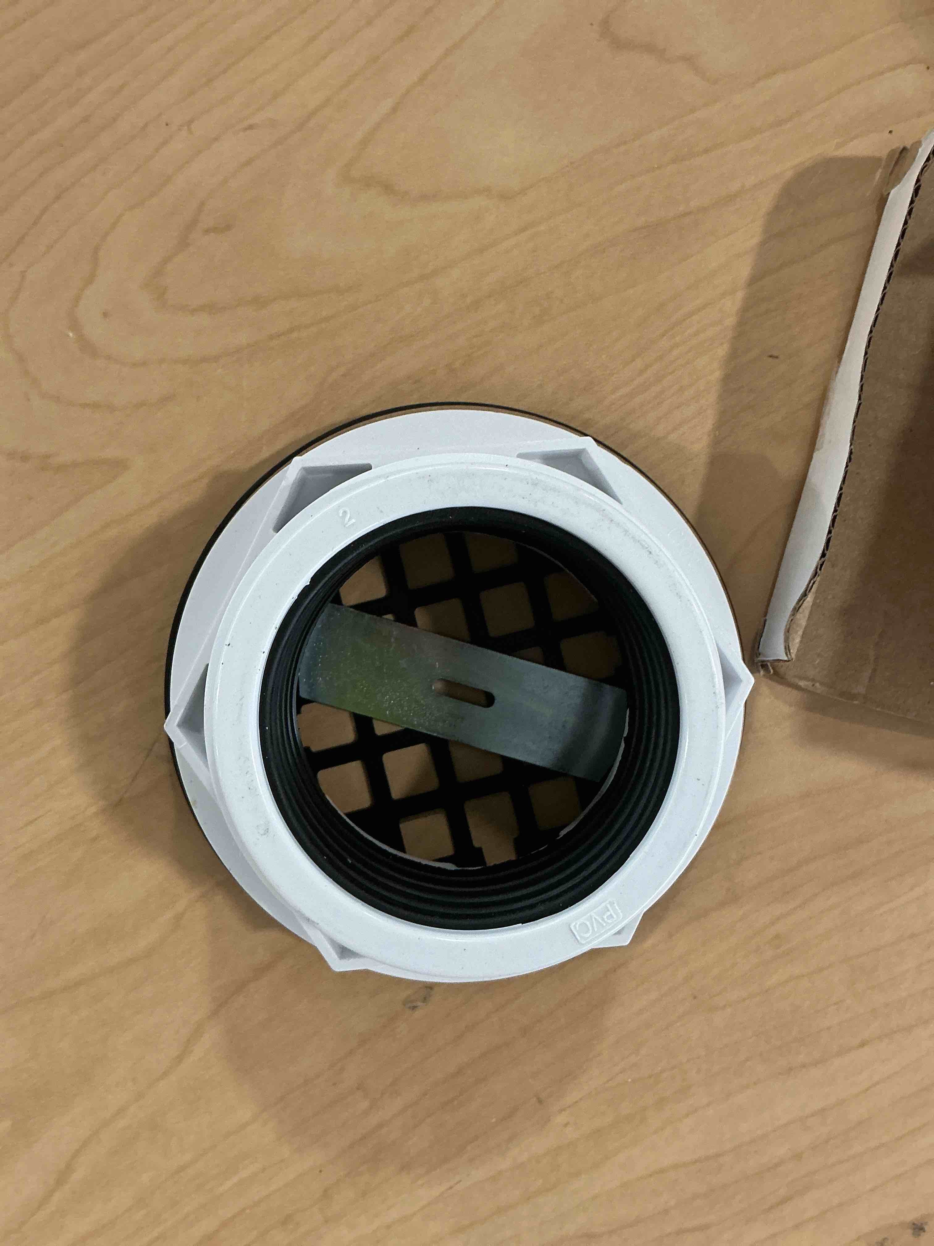 Condition photo showing New/Like New for westbrass d206p-62 2" no-caulk pvc compression shower drain with 4-1/4" round grid cover, matte black