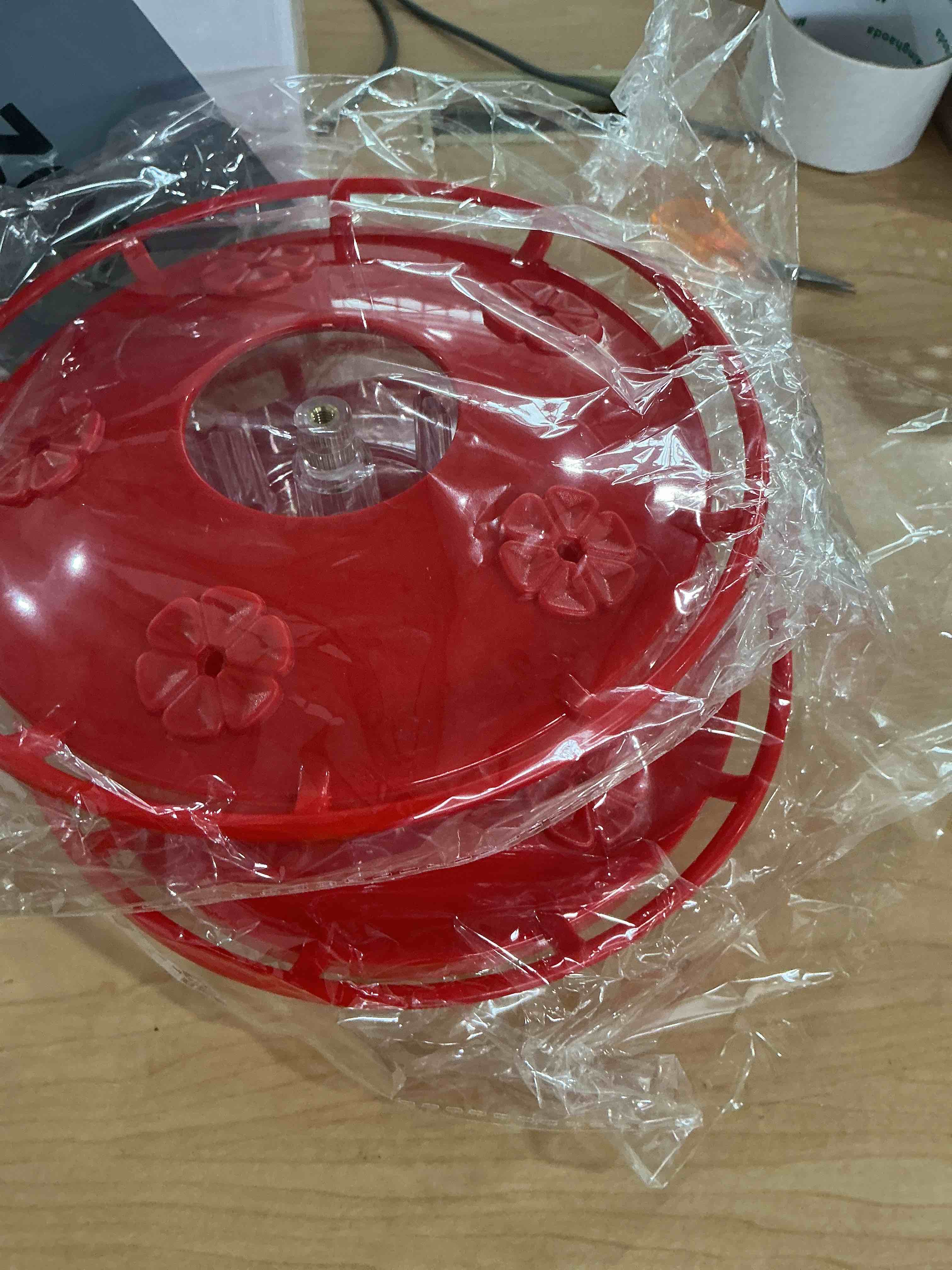 Condition photo showing New/Like New for ewonlife hummingbird feeder for outdoors hanging, humming bird feeders, easy to clean and fill, leak proof, 2 pack saucer feeder for birds, with clean brush and 8 feeding ports (16 oz/pack)