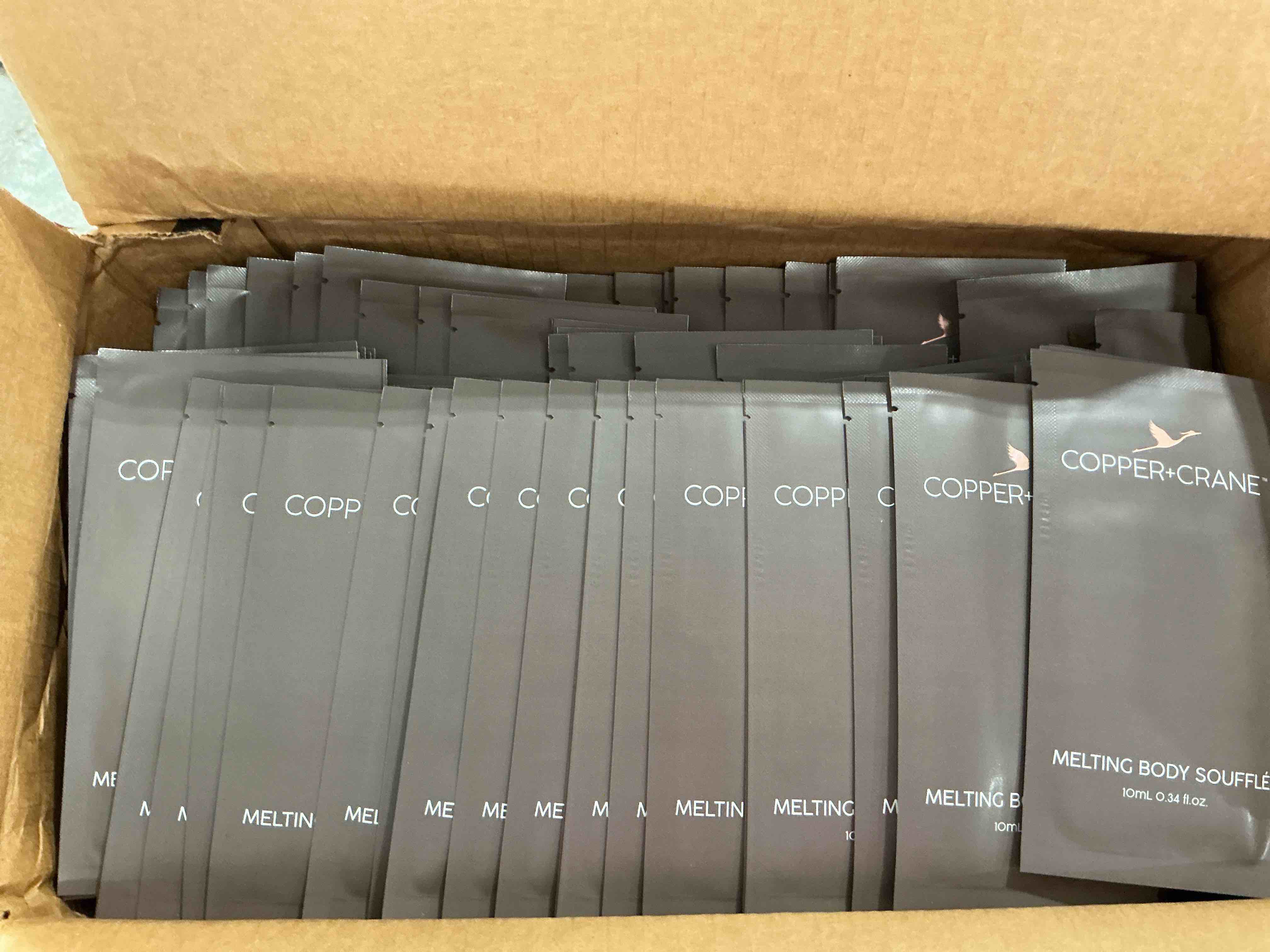 Condition photo showing New/Like New for copper + crane satin body nectar melting body soufflé packets 0.34 fl oz (300ct)