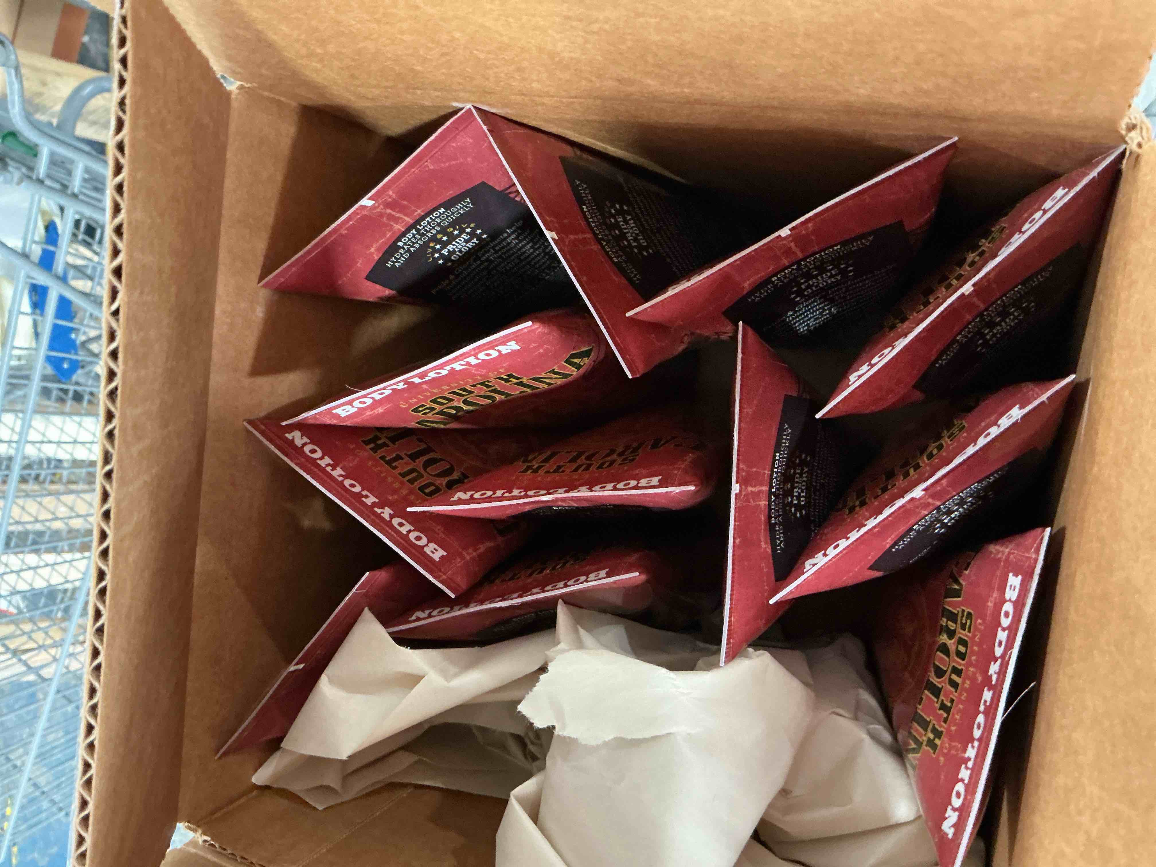 Condition photo showing New/Like New for university of south carolina gamecocks licensed shower body lotion with shea butter unscented 6.7oz (12ct)