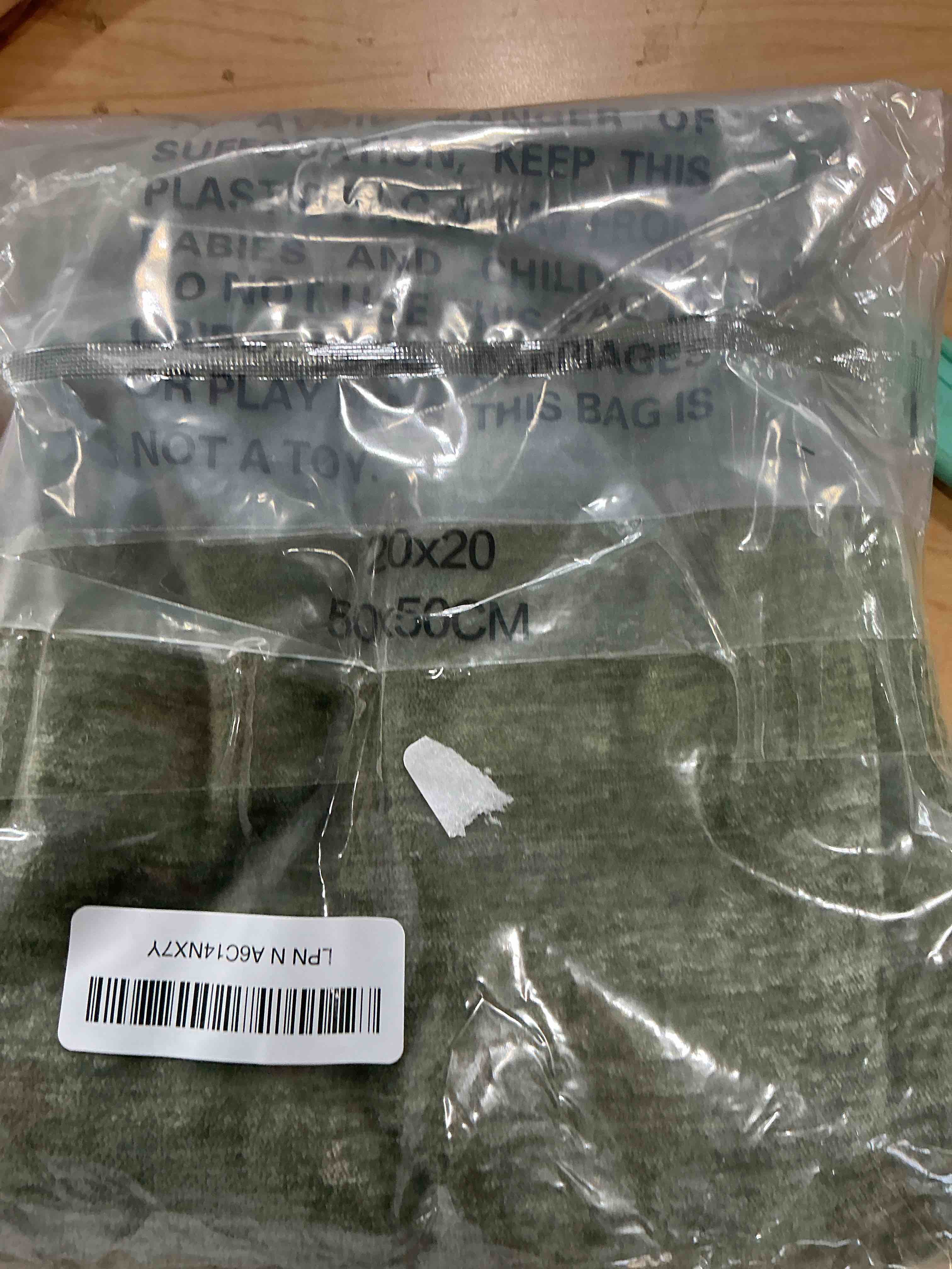 Condition photo showing Good Condition for decorUhome Chenille Olive Green Spring Throw Pillow Covers 20x20 Inch Set of 2, Decorative Soft Couch Pillow Covers Solid Dyed Accent Farmhouse Neutral Square Pillow Cases for Sofa Olive Green 20" x 20" (Pack of 2)