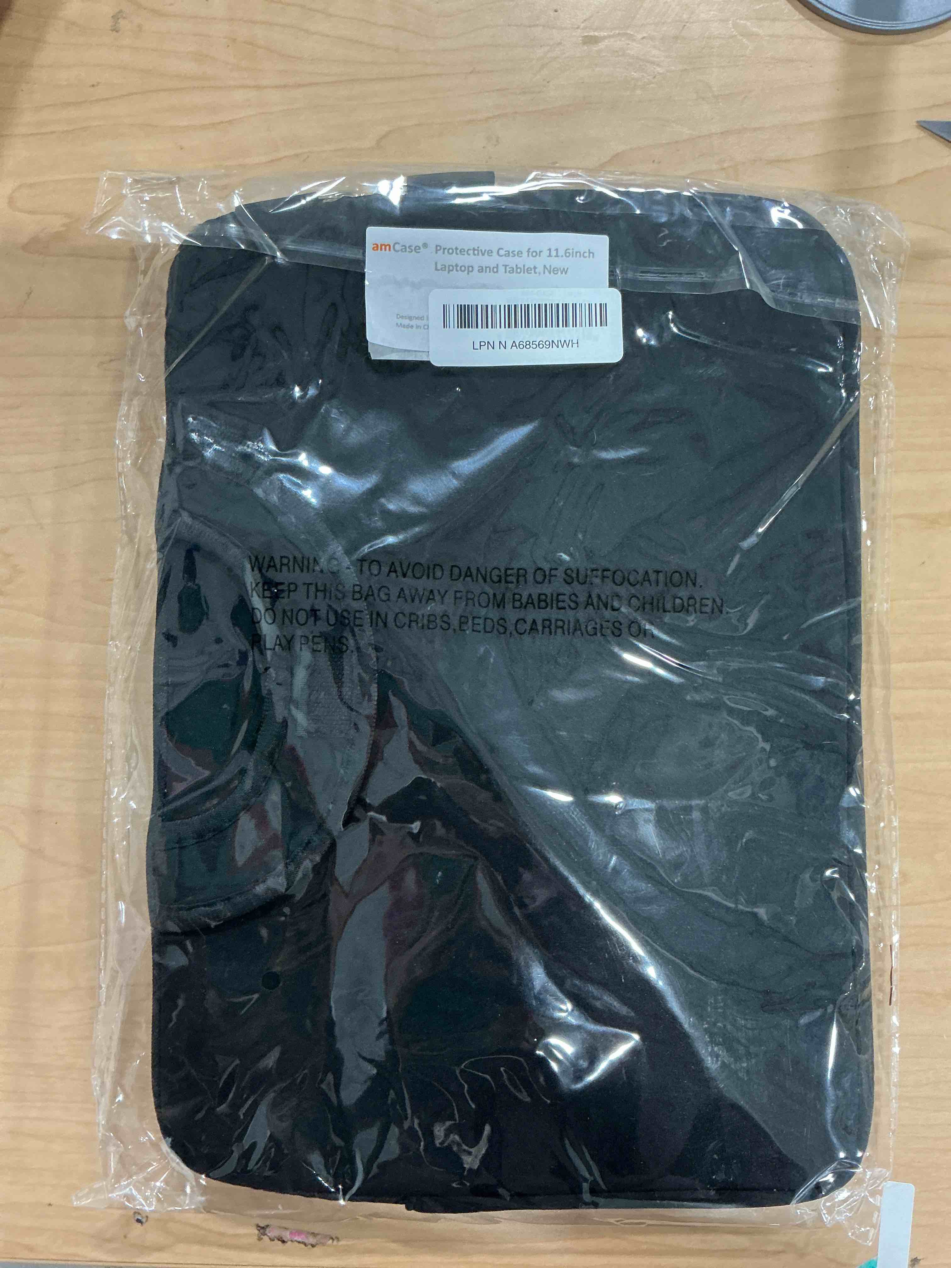 Condition photo showing New/Like New for amCase Chromebook Case-11.6 to 12 inch Neoprene Travel Sleeve with Handle-Black 11.6 to 12 inch Black