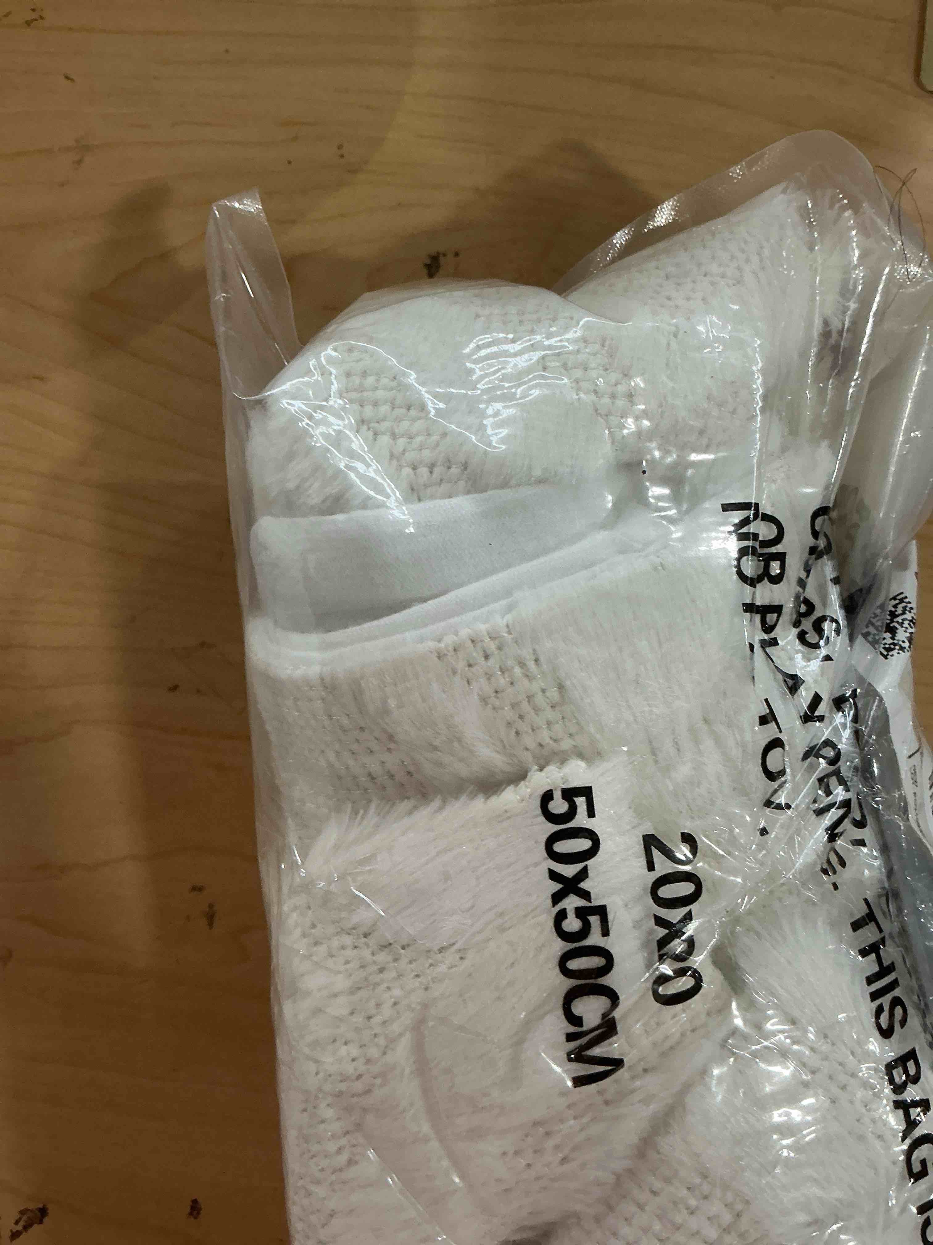 Condition photo showing Good Condition for decorUhome Spring Throw Pillow Covers 20x20 Inch Set of 2, Soft Plush Faux Wool Cream White Solid Couch Pillow Covers, Accent Farmhouse Neutral Square Pillow Cases for Sofa Bed Living Room 20" x 20" (Pack of 2) Cream White