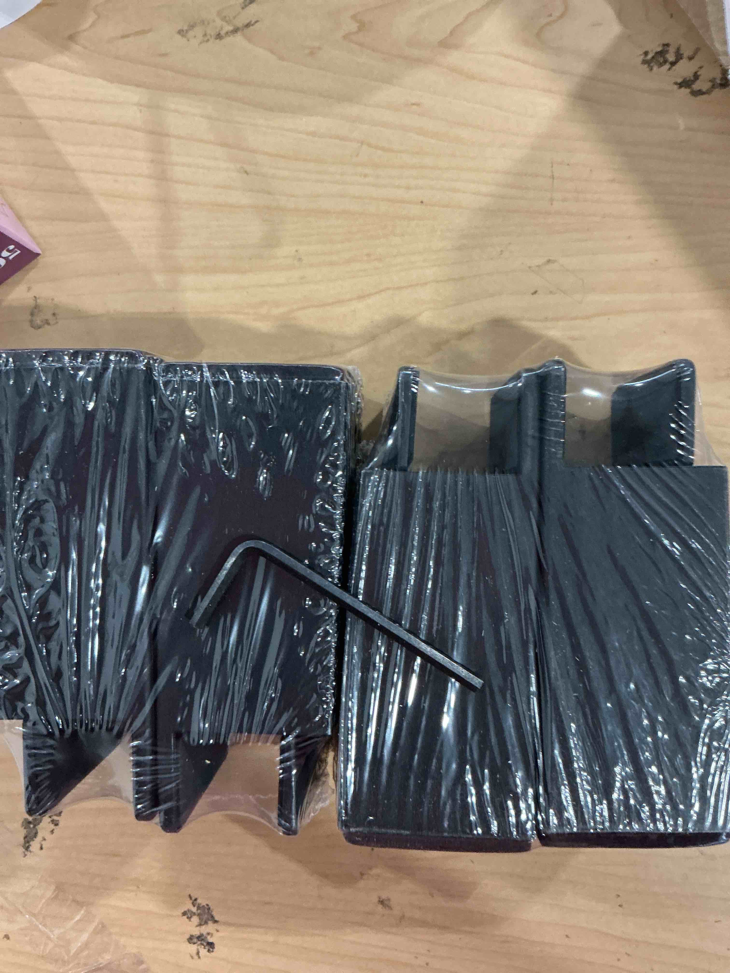 Condition photo showing New/Like New for Bed Risers with Adjustable Screw Clamp, Fits Thickness of Furniture Frame from 0 to 1.5 Inch, Furniture Risers 4 Inch Heavy Duty Risers for Table Cabinet Support up to 5000lbs (4Pack, Black) Black 4'', Fits Furniture Frame Below 1.5"