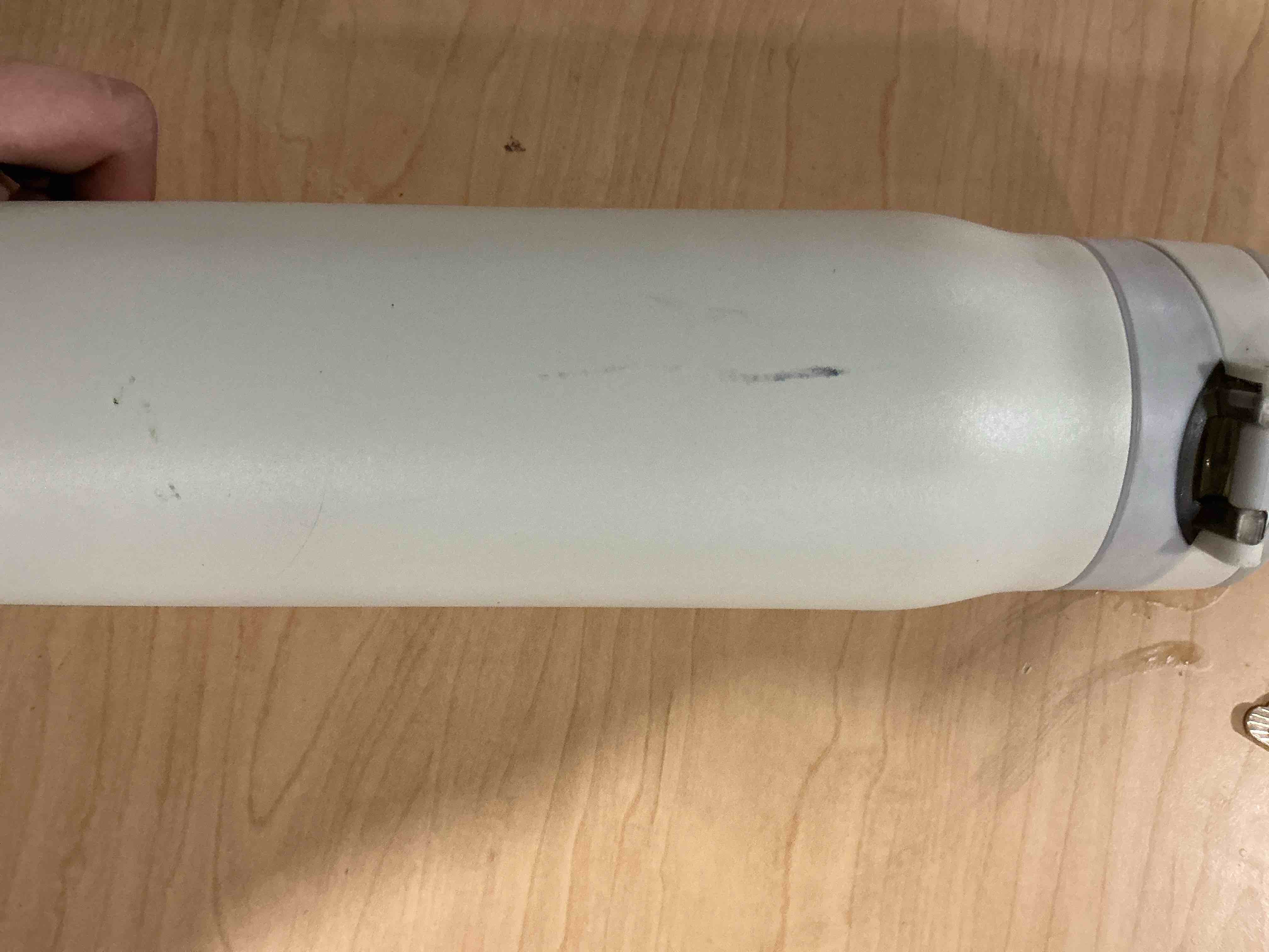 Condition photo showing Good Condition for Simple Modern Mesa Loop Water Bottle with Covered Straw and Handle | 30oz Cup Holder Friendly Insulated Stainless Steel Bottles for Travel, Sports and School | Cashew 30 Ounce has a couple of small dents s -Cashew