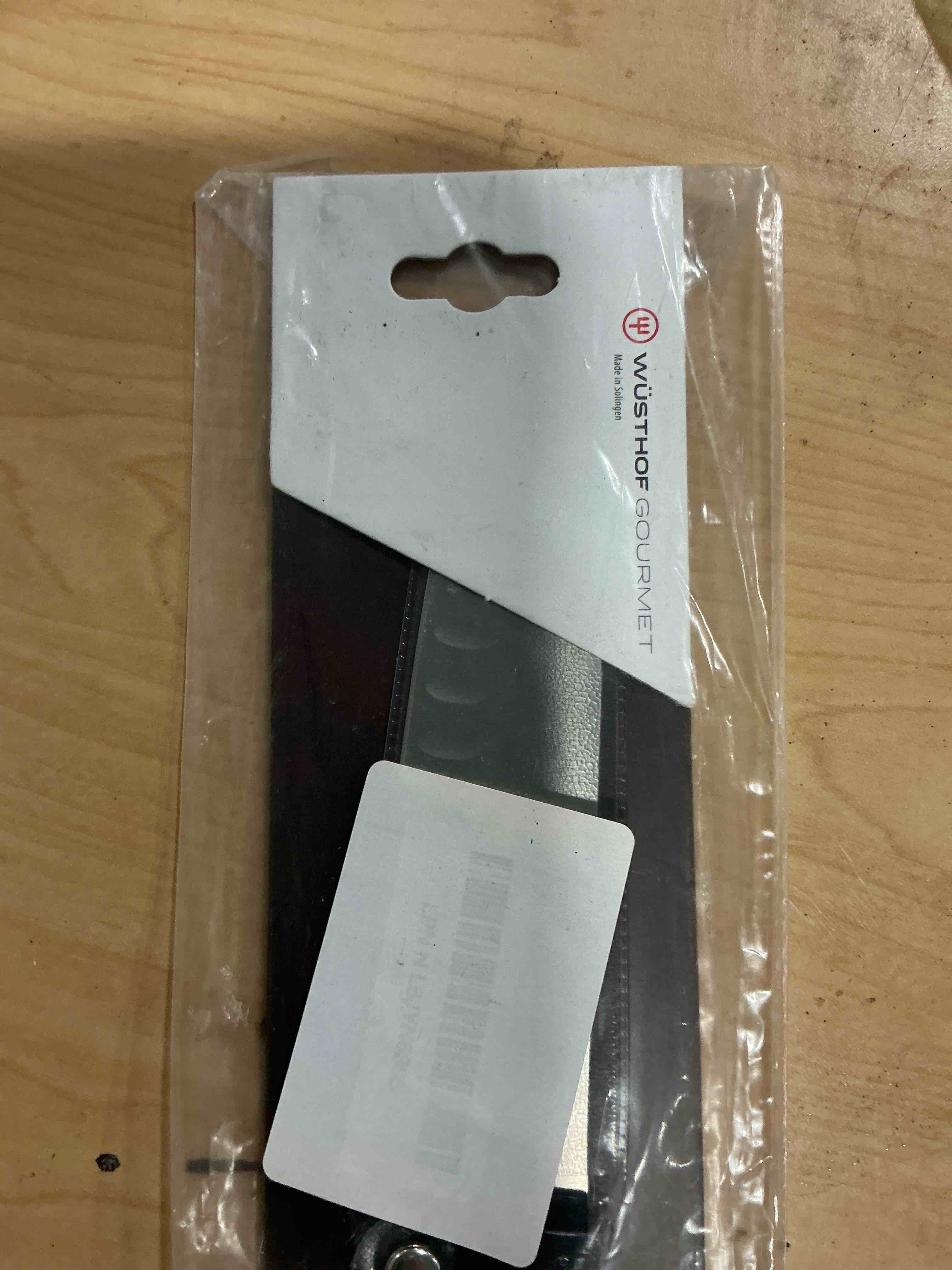 Condition photo showing Good Condition for WÜSTHOF Gourmet 5" Hollow Edge Santoku Knife, Black