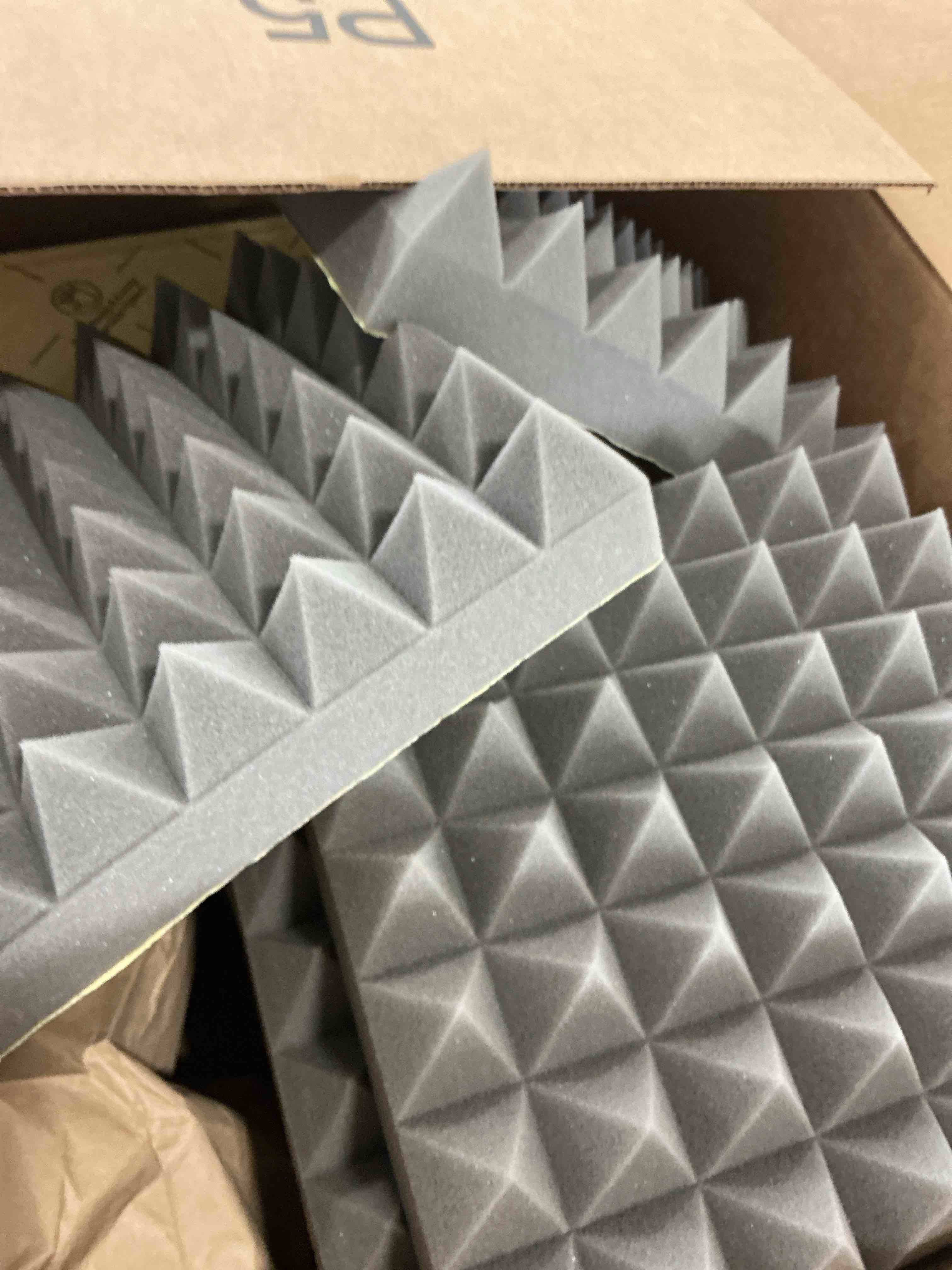 Condition photo showing Good Condition for Sonicism Sound Proof Foam Panels for walls Self-Adhesive 12Pack Pyramid 12" X 12" X 2" Acoustic Panels 35kg/m³High Density,Soundproof Wall Panels Fast Expand,Sound Absorption and Decoration,Black