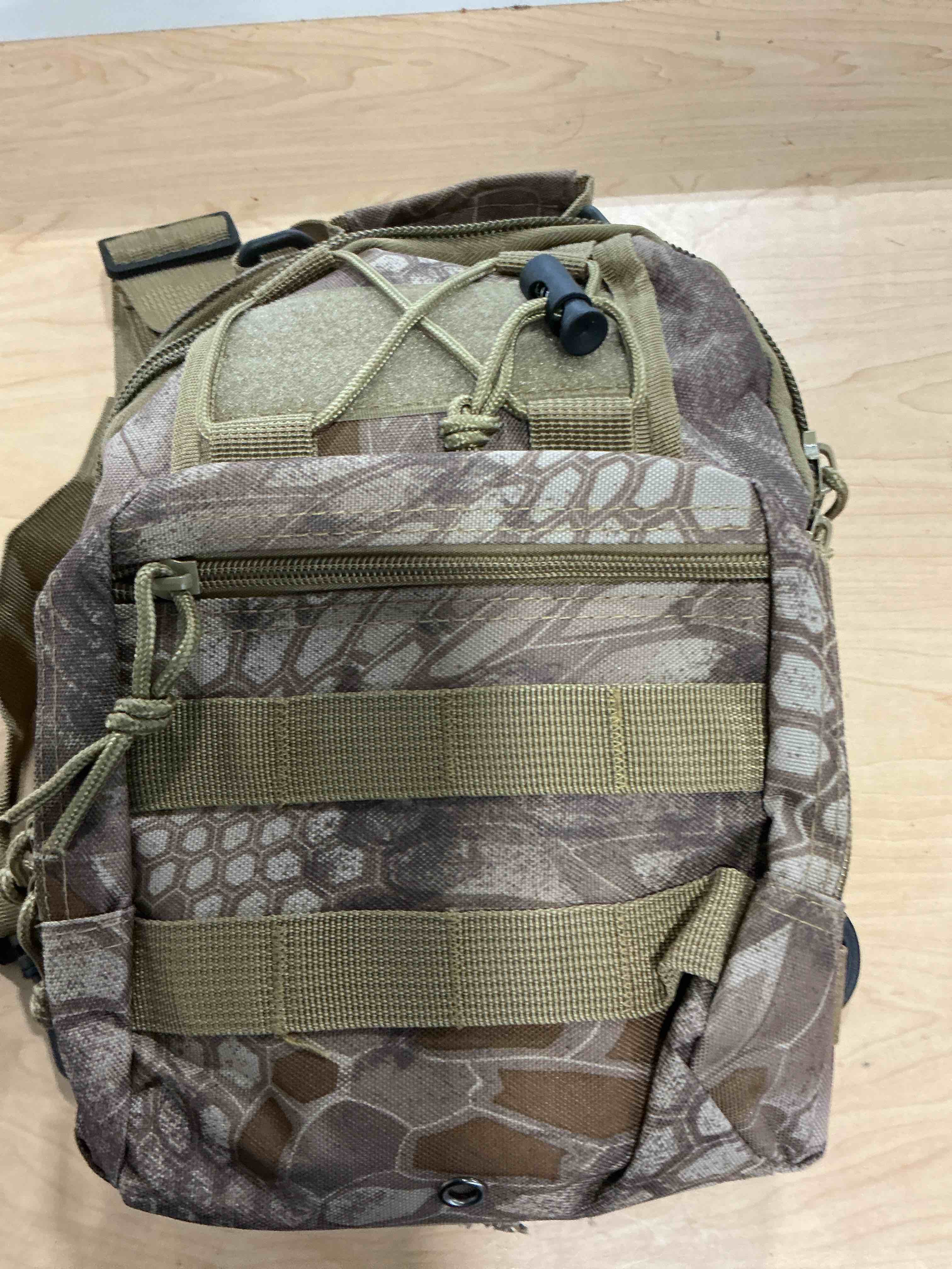 Condition photo showing Good Condition for Viriber Tactical Backpack, first aid kit Waterproof Military Cross-body Molle Sling Shoulder Backpack Chest Bag for Outdoor Every Day Carry Khaki Green ACU