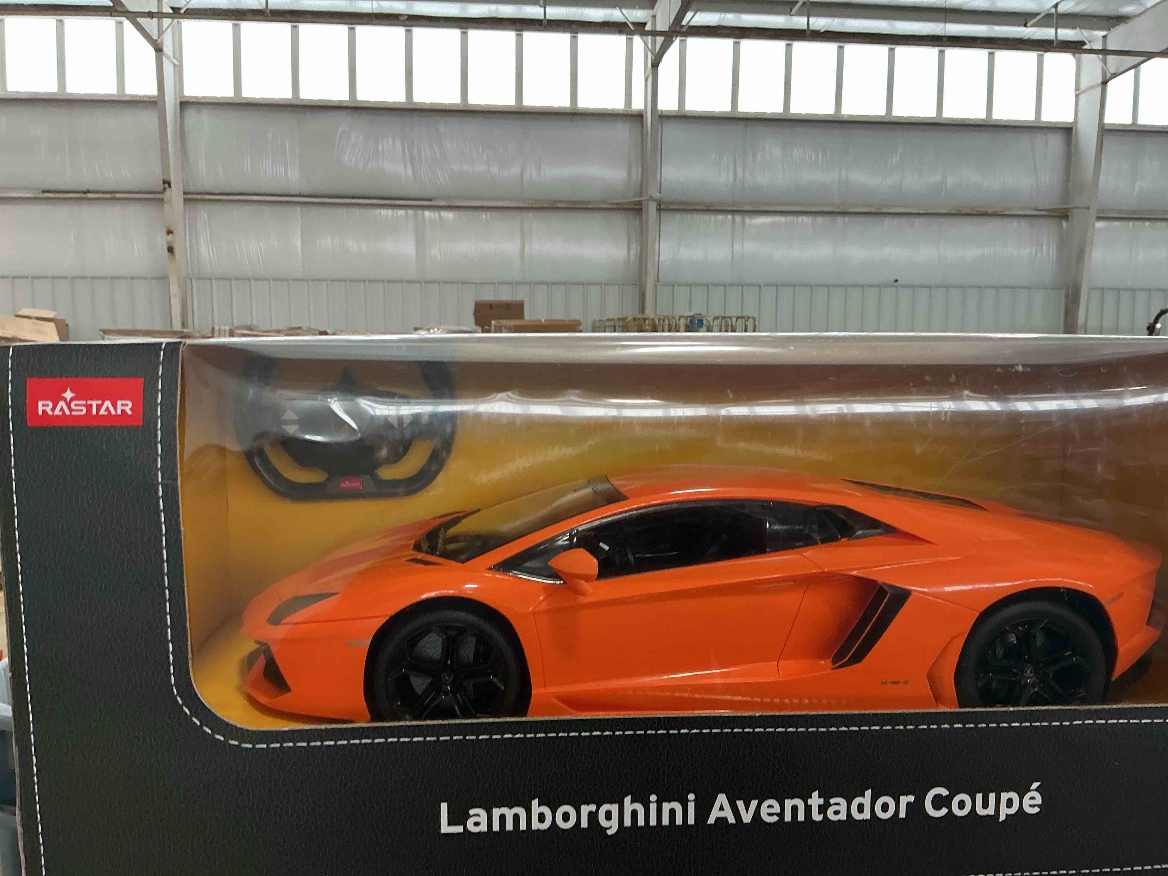 Condition photo showing New/Like New for BEZGAR Remote Control Car Licensed RC, 1:24 Lambo Toy Car for Kids, Lambo Aventador SVJ Remote Control Model Electric Sport Racing Hobby Toy for 3 4 5 Year Old Boy Birthday Gift (Orange)