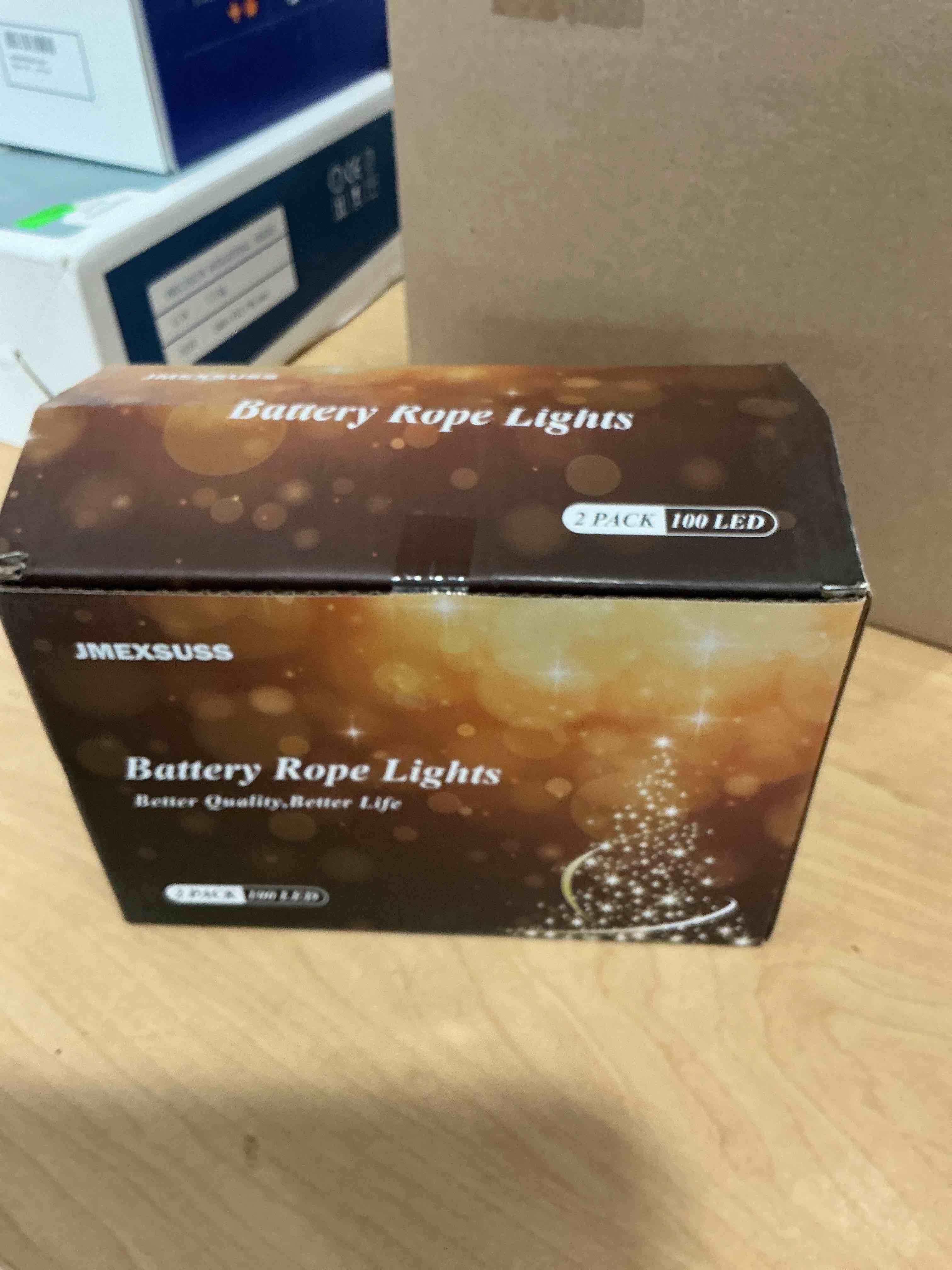 Condition photo showing New/Like New for JMEXSUSS 2 Pack Christmas Lights Battery Operated Rope Lights Outdoor Waterproof Total 200LED 8 Modes Battery Powered String Lights with Remote for Car Trampoline Tree Christmas Decor (Multicolor) 2*100LED Multicolor