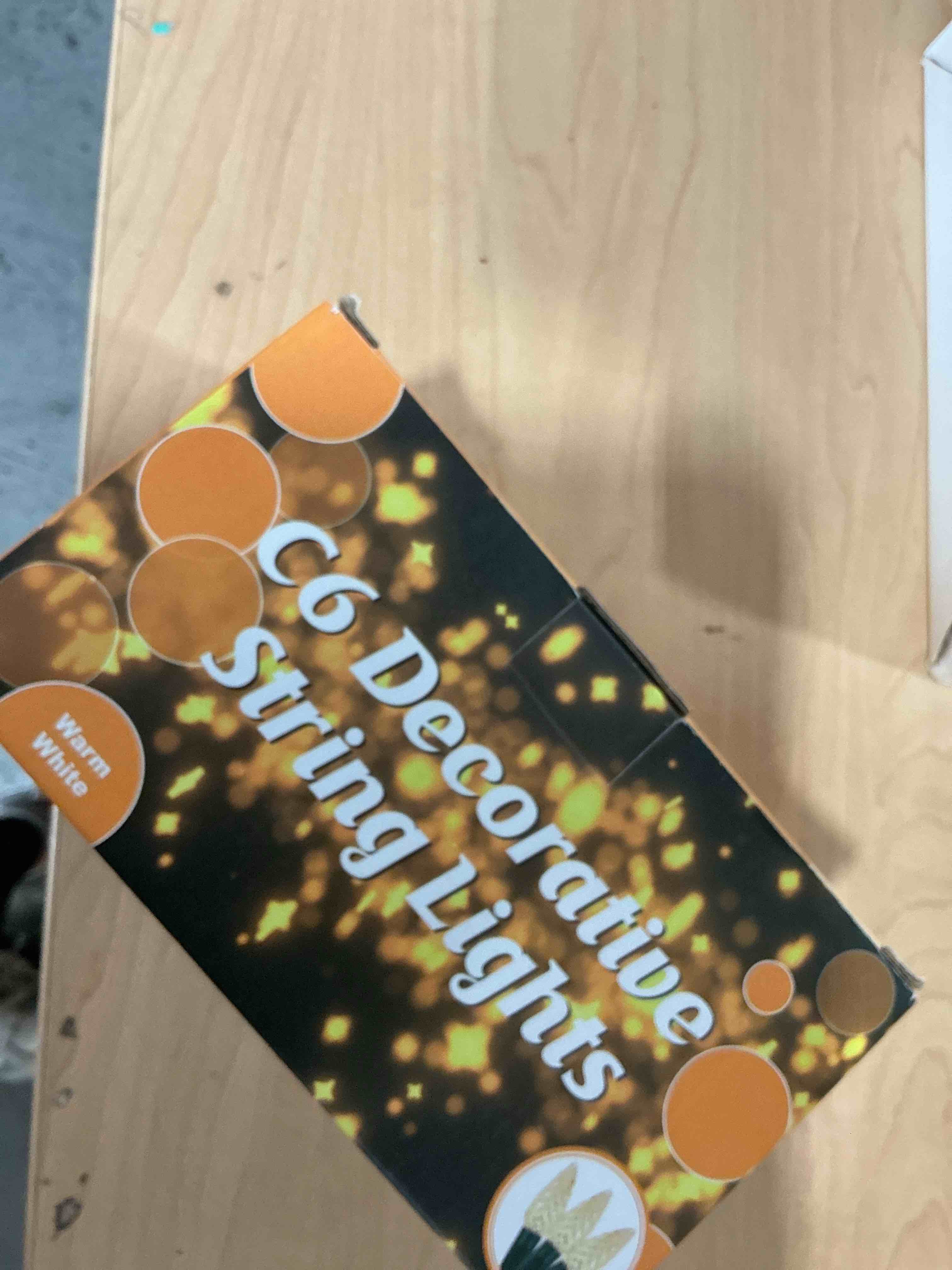 Condition photo showing New/Like New for WATERGLIDE C6 Christmas Lights, 33ft 100 LED Faceted String Lights Green Wire Fairy Lights with 29V Safe Adaptor, 8 Lighting Mode, Waterproof for Indoor Outdoor Patio Xmas Tree Party Decor, Warm White