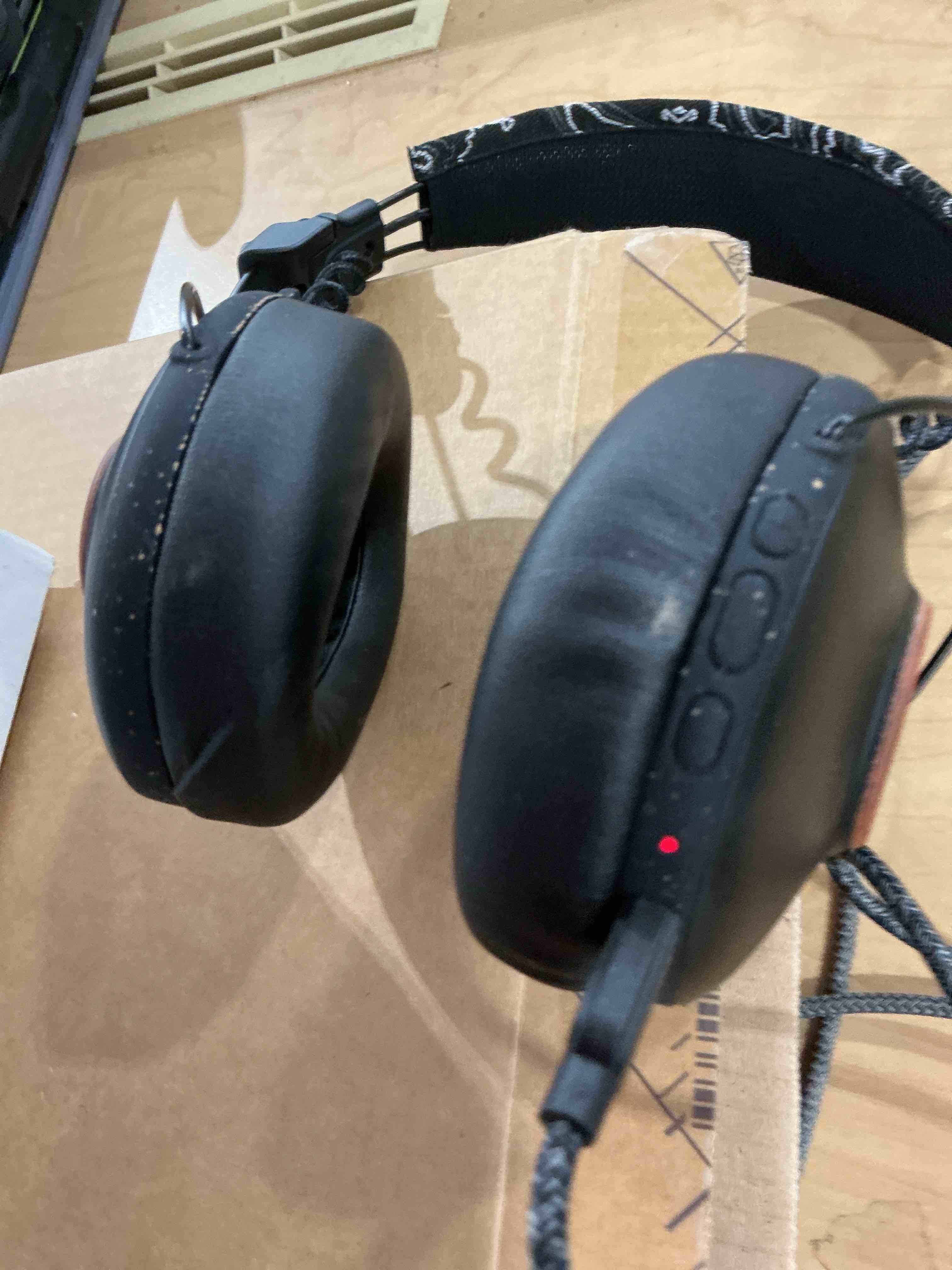 Condition photo showing Good Condition for House of Marley Positive Vibration Frequency: Over-Ear Wireless Headphones with Microphone, Wireless Bluetooth Connectivity, 34 Hours of Playtime and Quick Charge Technology, Signature Black