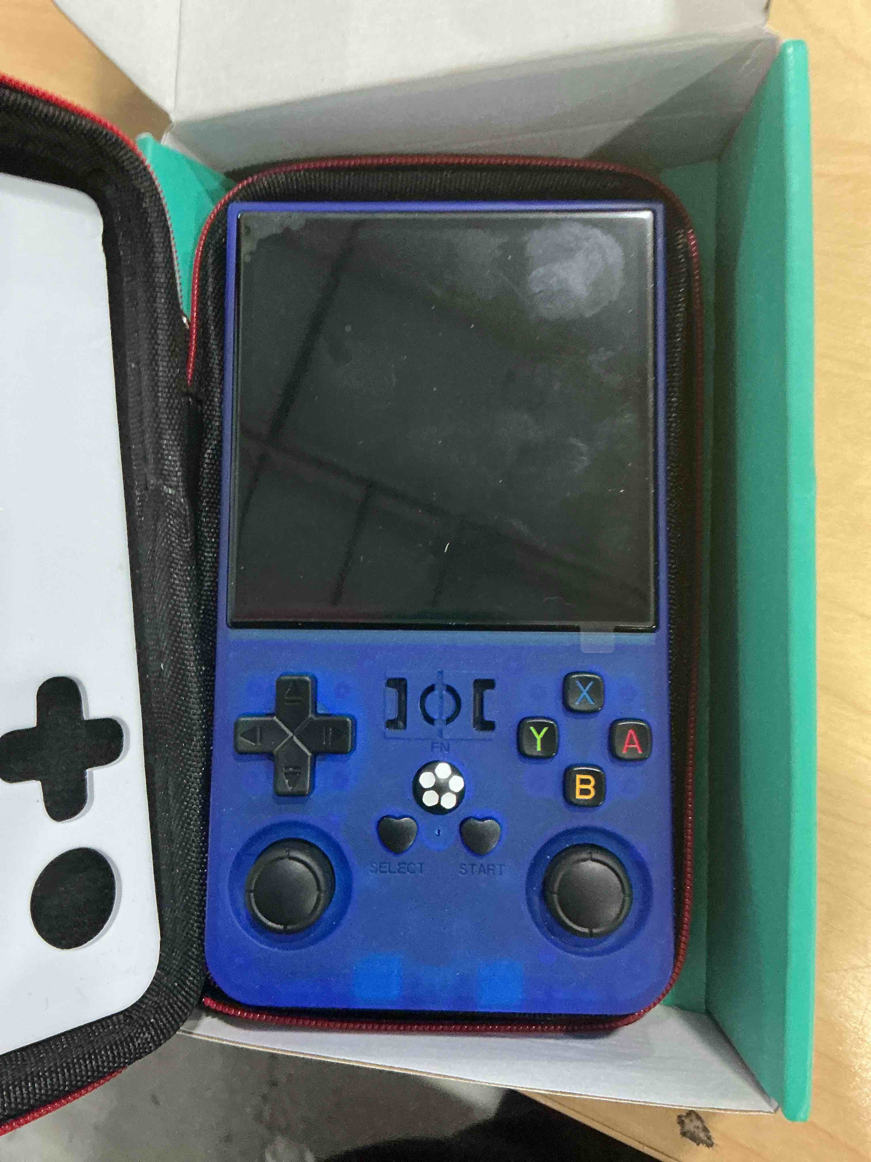 Condition photo showing New/Like New for R36MAX Retro Handheld Game Console,64GB Open Source System Support 30+ Emulator Console,4.0 Inch IPS Screen Retro Gaming Console,4000mAh Battery,Video Game Console for Christmas-Transparent Blue