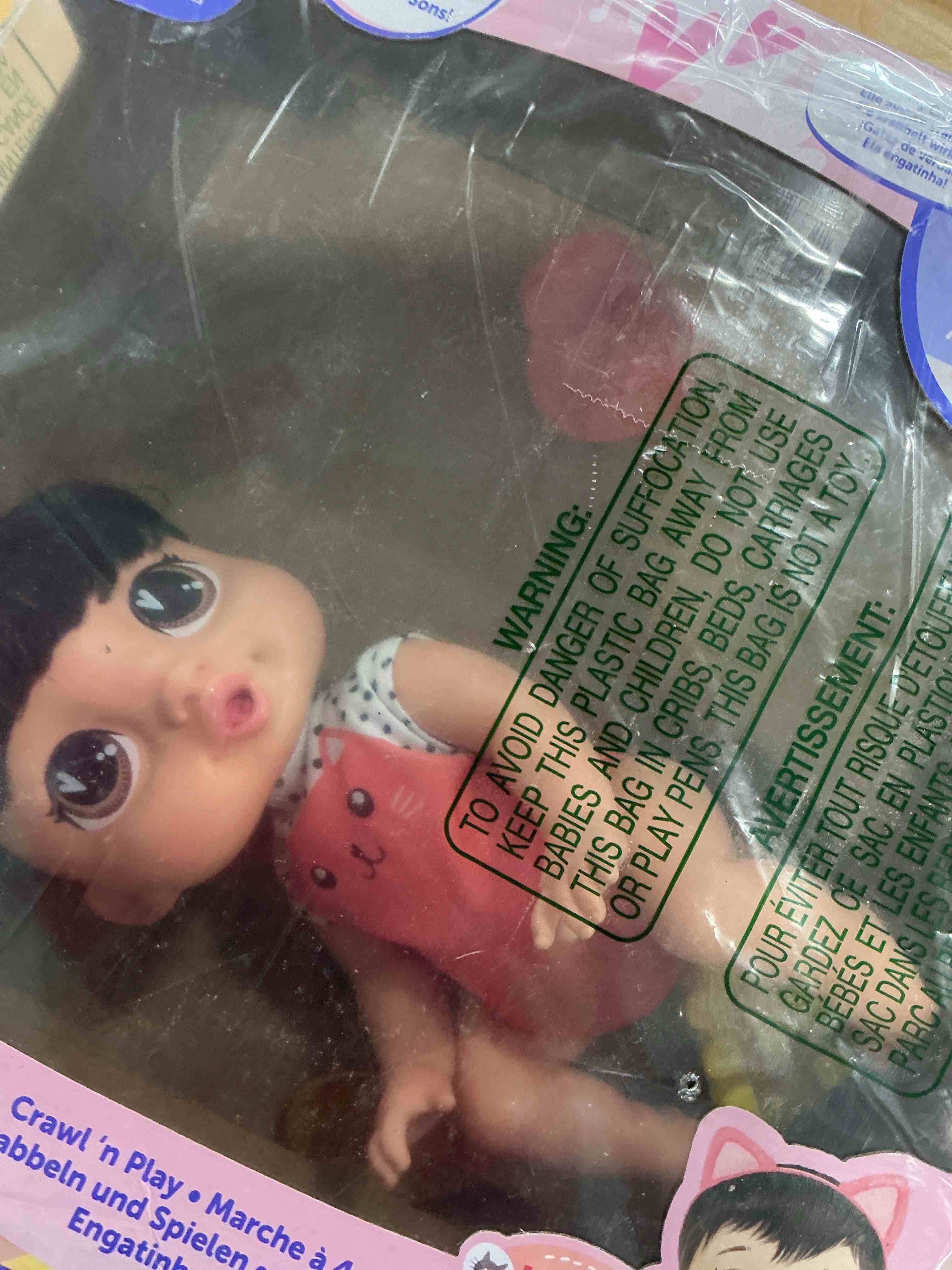 Condition photo showing Good Condition for Baby Alive Crawl 'n Play Katie Kat Electronic Crawling Baby Doll Set, Black Hair, Kids Toys for Girls & Boys 3 Years & Up, 10.75 Inches