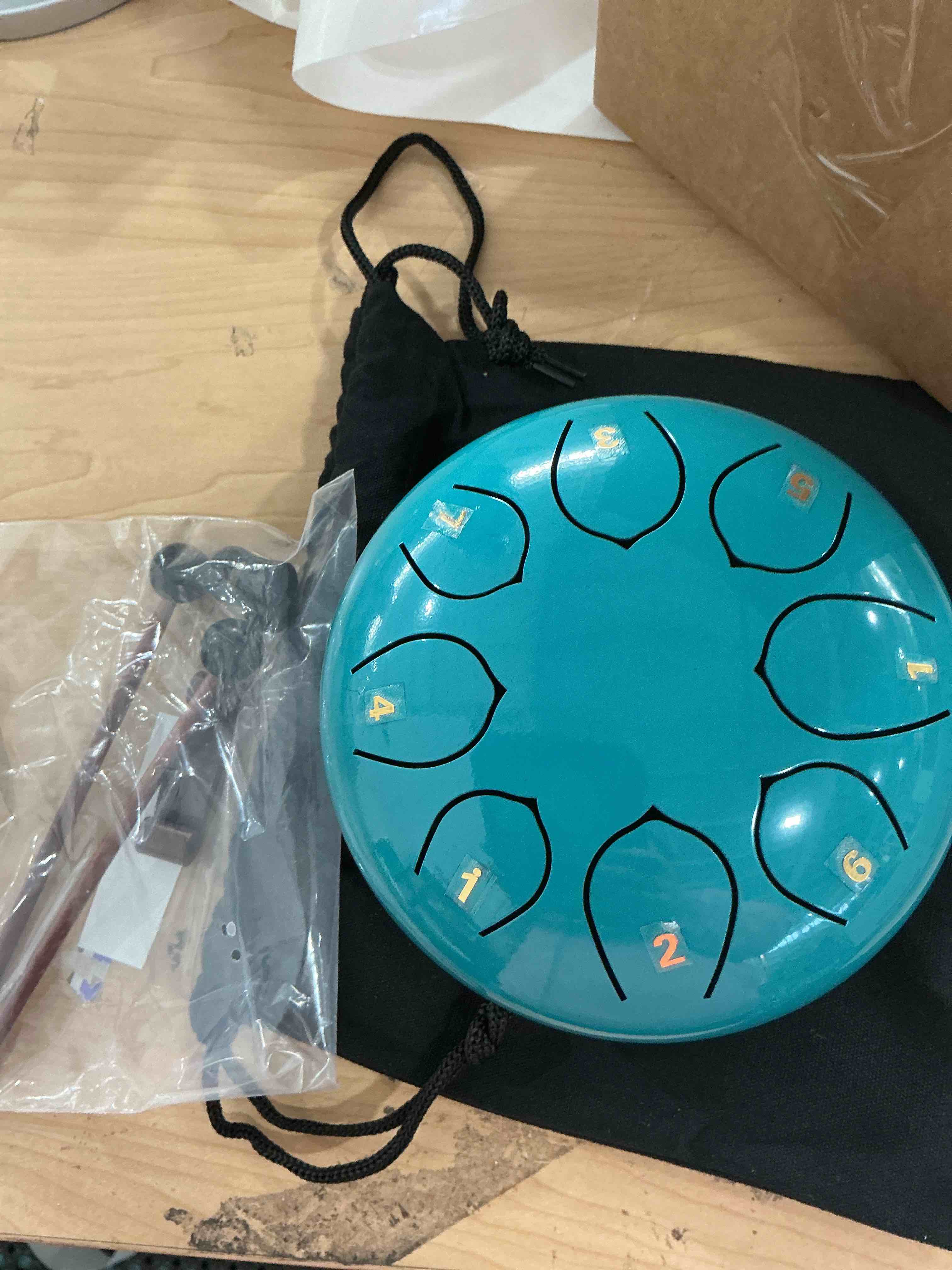 Condition photo showing Good Condition for Rain Drum for Outside Garden, 6 Inches 8 Notes Steel Tongue Chakra Drums, Waterproof Meditation Rain Chime, Musical Instruments for Adult Gift with Bag, Music Book, Drum Mallets (Blue) 6 Inches Lake Blue