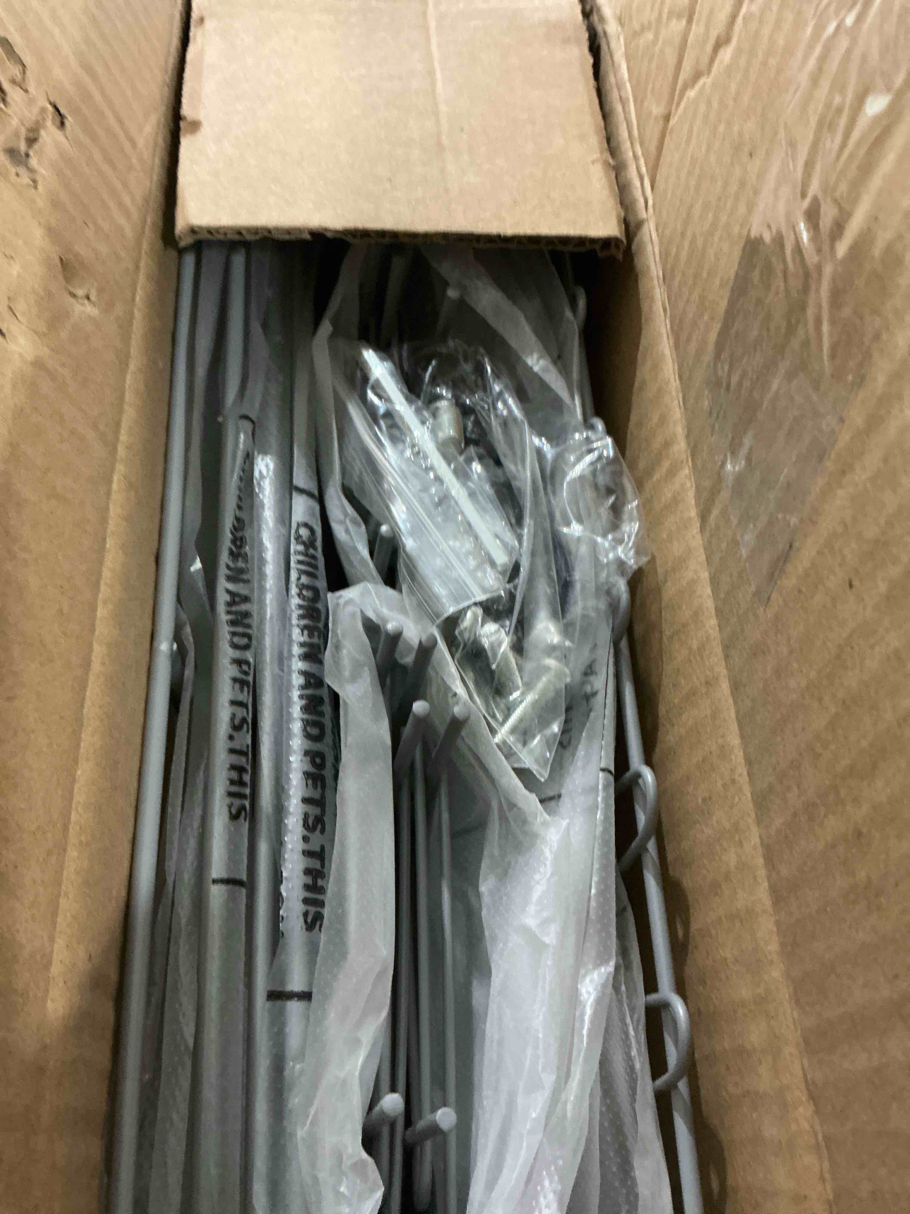 Condition photo showing Good Condition for smusei 4 Tier Water Bottle Storage Rack Metal Water Bottle Organizer for Floor, Free Standing Bottled Water Holder Stand Beverage Pantry Drink Shelf Dispenser for Kitchen Pantry Silver 4 Tier