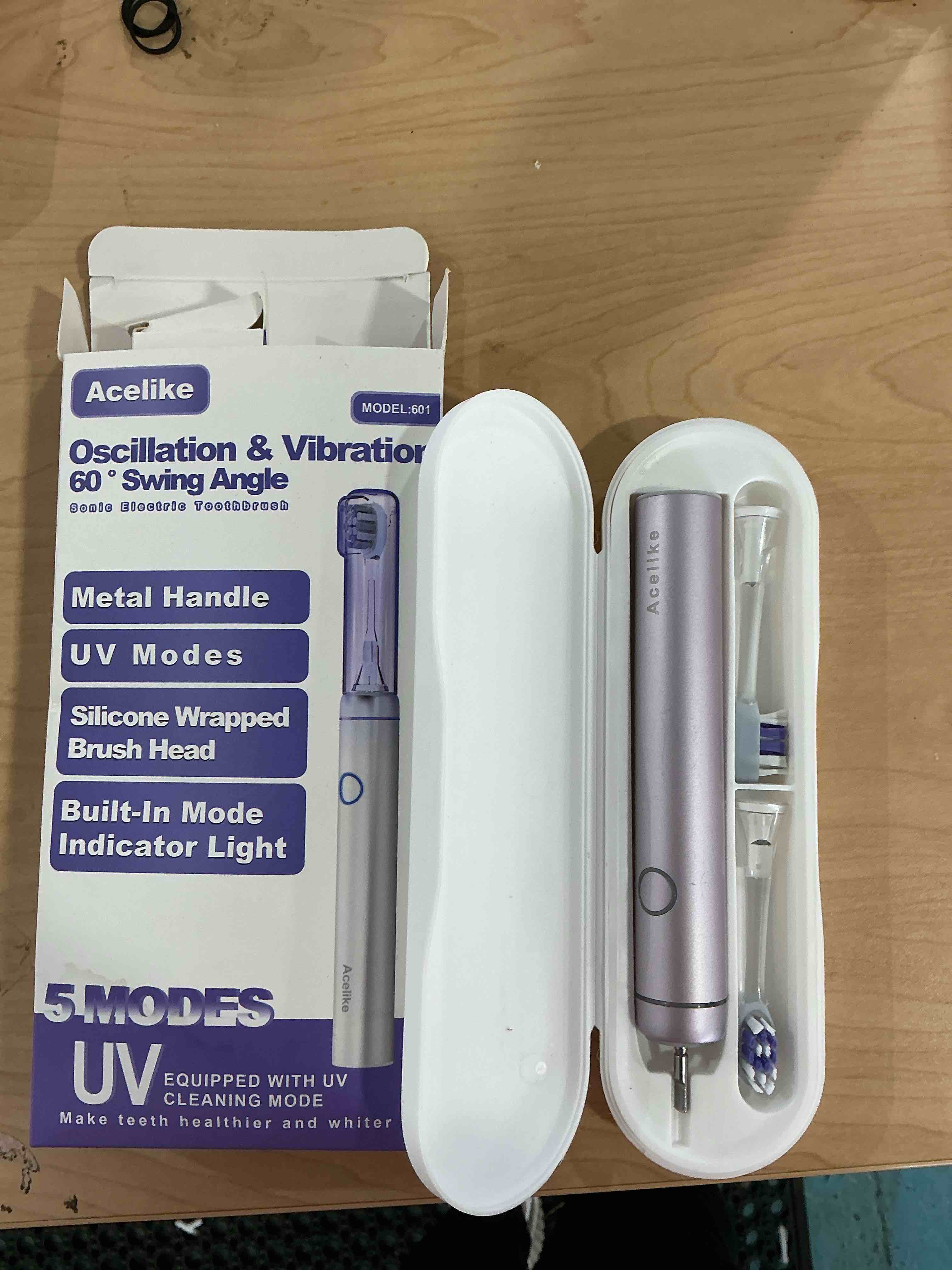 Condition photo showing Good Condition for Metal Electric Toothbrush with UV Mode, Vibration and Oscillation Electric Toothbrush for Adults, 6 Brush Heads & Travel Case & Dust Cover, 5 Modes & Built in Timer, One Charge Last 120 Day?Rose?