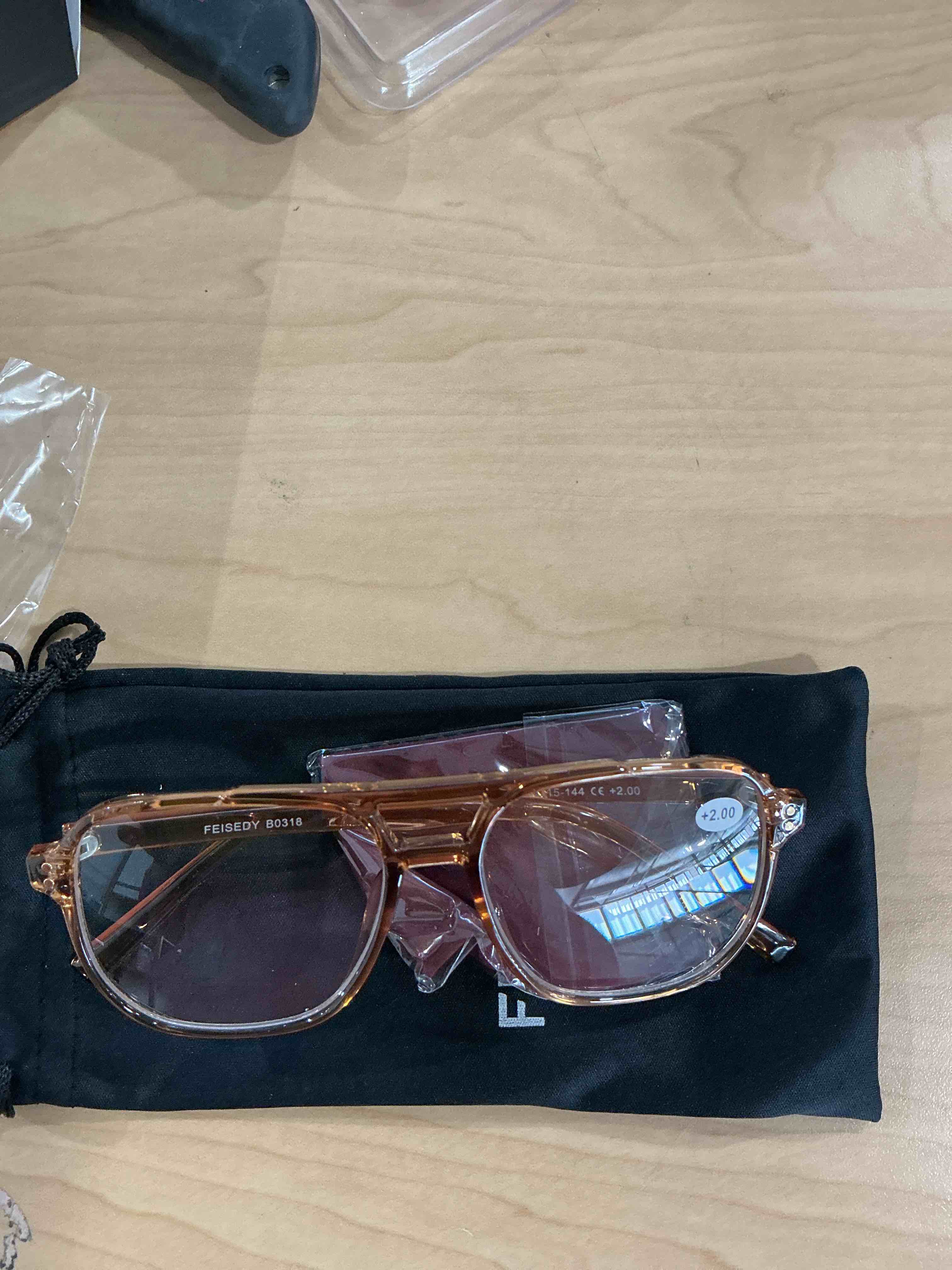 Condition photo showing New/Like New for feisedy blue light reading glasses for woman men, fashion square pilot computer glasses, anti eyestrain glare readers b0318 transparent tea 2.0 x