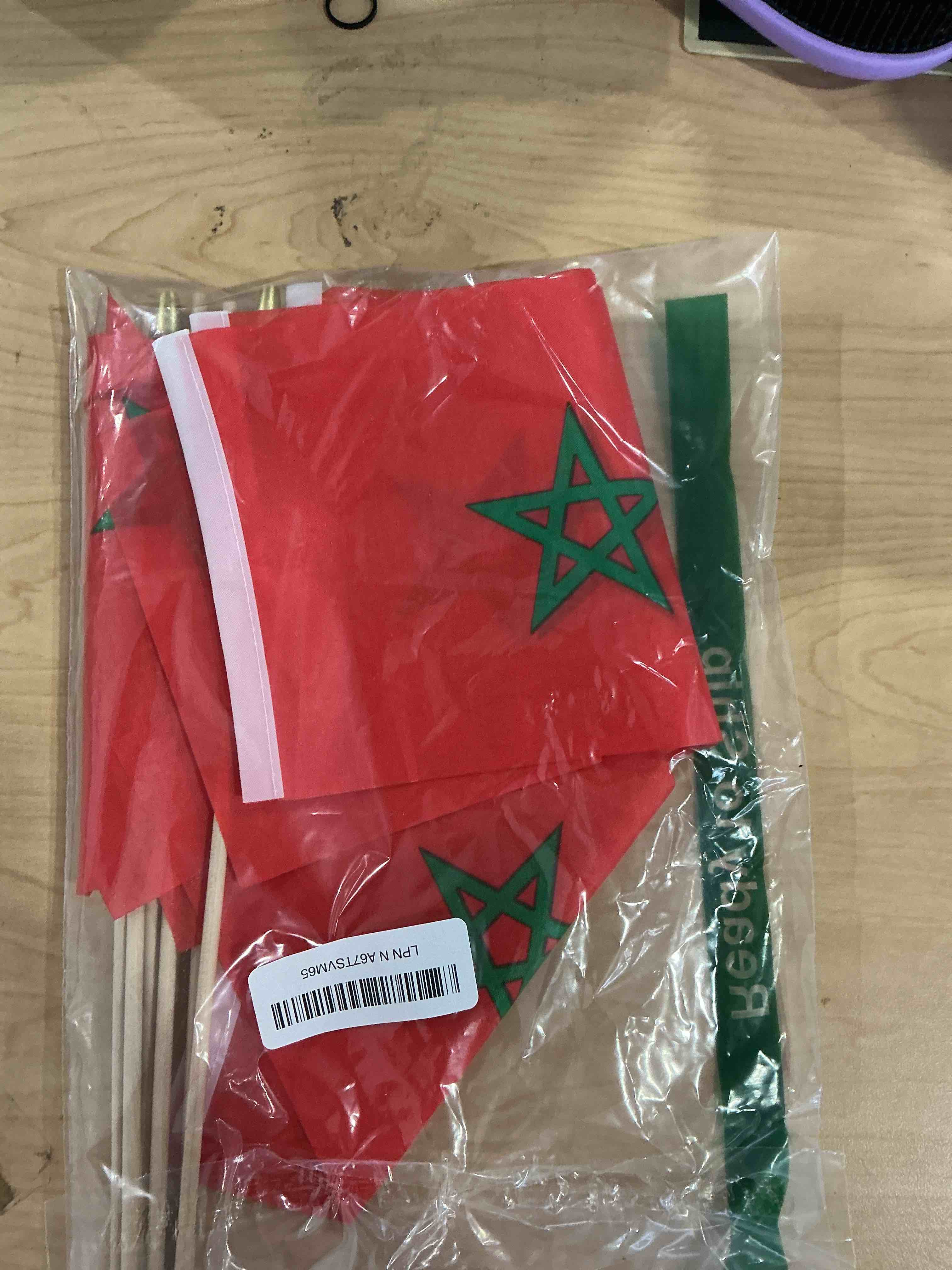 Condition photo showing New/Like New for 12Pcs Small Morocco Flags on Wooden Stick Mini Moroccans Flag Hand Held Flag Decorations,5x8 Inch