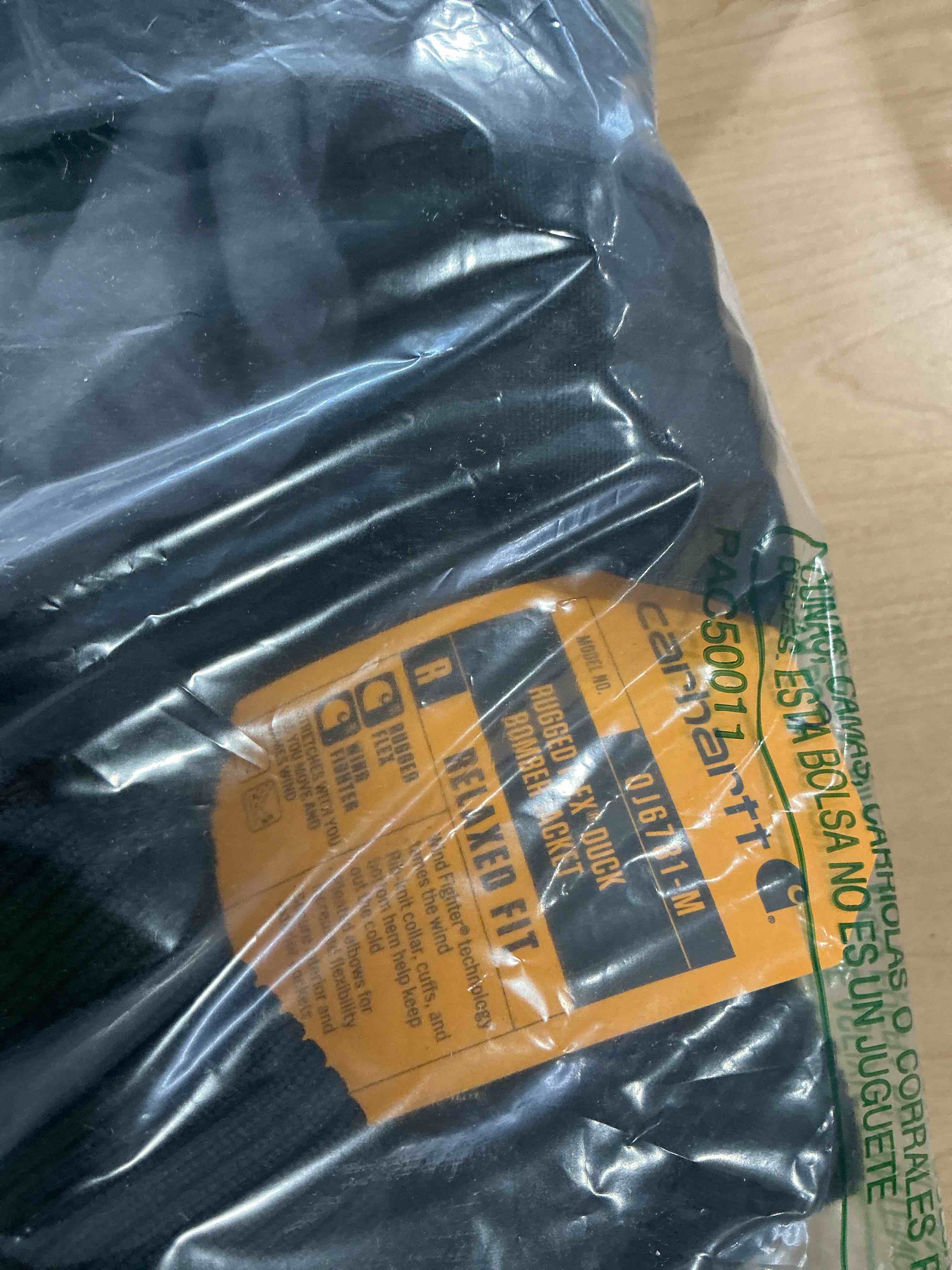 Condition photo showing New/Like New for Carhartt Men's Rugged Flex Duck Relaxed Fit Bomber Jacket X-Large Black