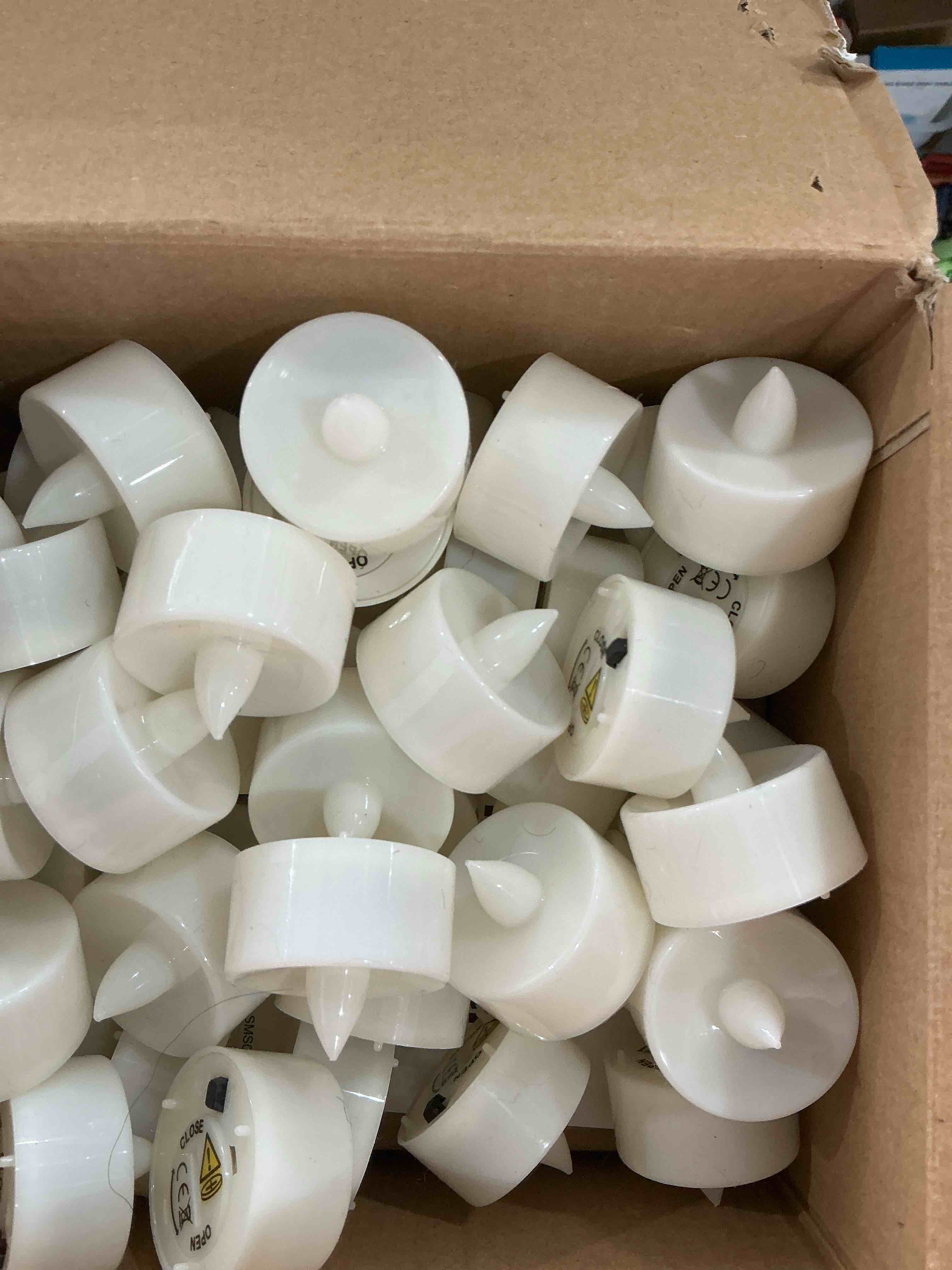 Condition photo showing New/Like New for Amagic 100 Pack Battery Operated Tea Lights Candles, Fake Tealights Candles, Flameless LED Tea Lights for Halloween, Wedding, Votive, Festival, Table Decor(100 Pack, Warm White) White 100 Pcs